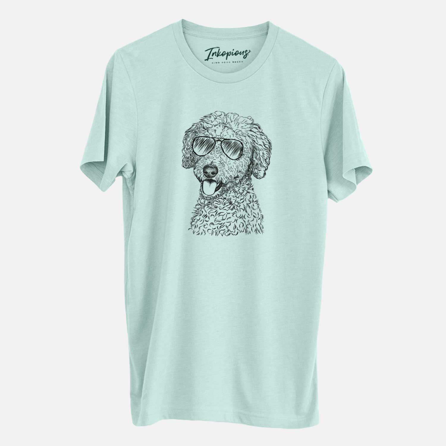 Hand-drawn sketch of Marlow the Goldendoodle wearing aviator sunglasses on a Heather Sage Unisex crewneck