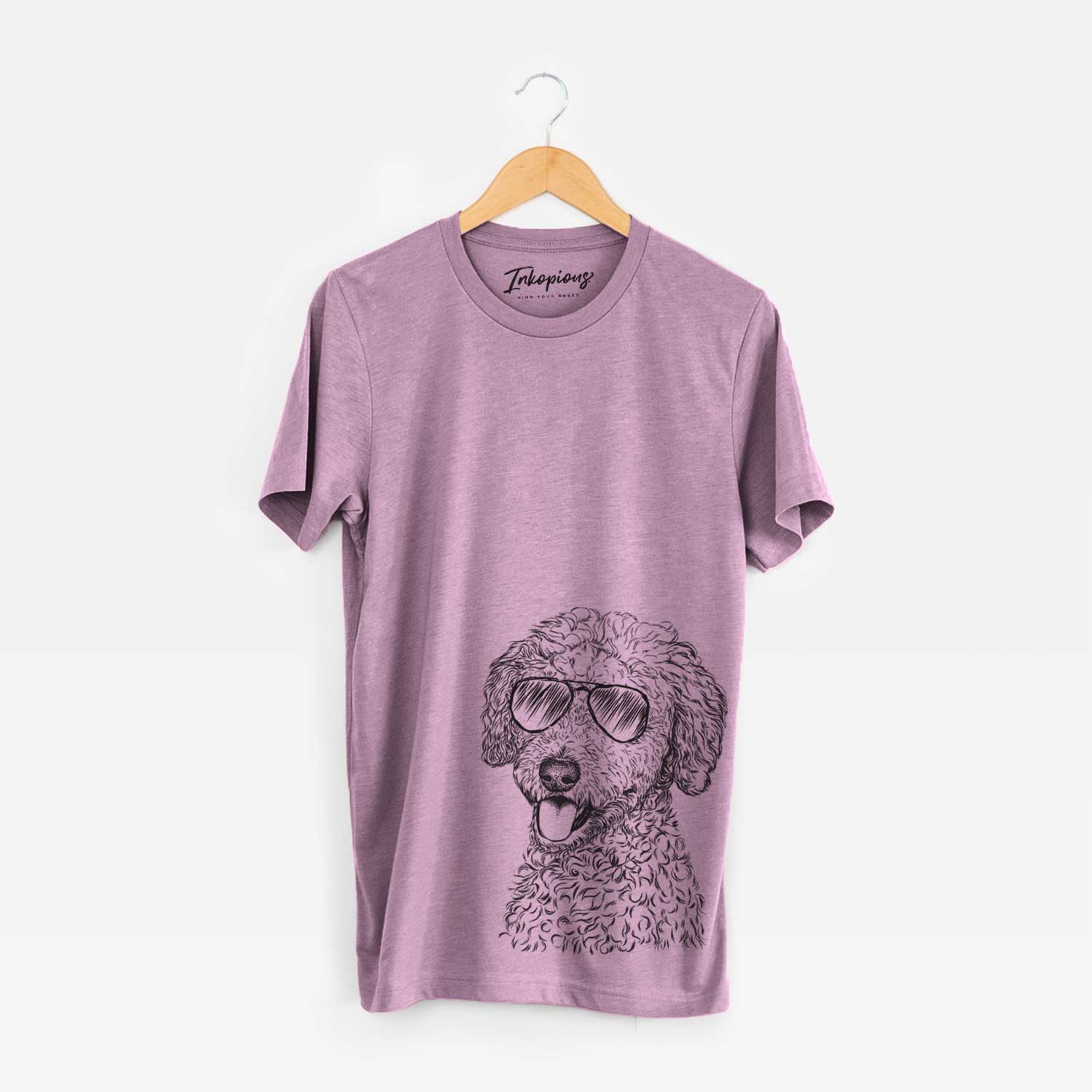 Hand-drawn sketch of Marlow the Goldendoodle wearing aviator sunglasses on an Orchid Unisex crewneck