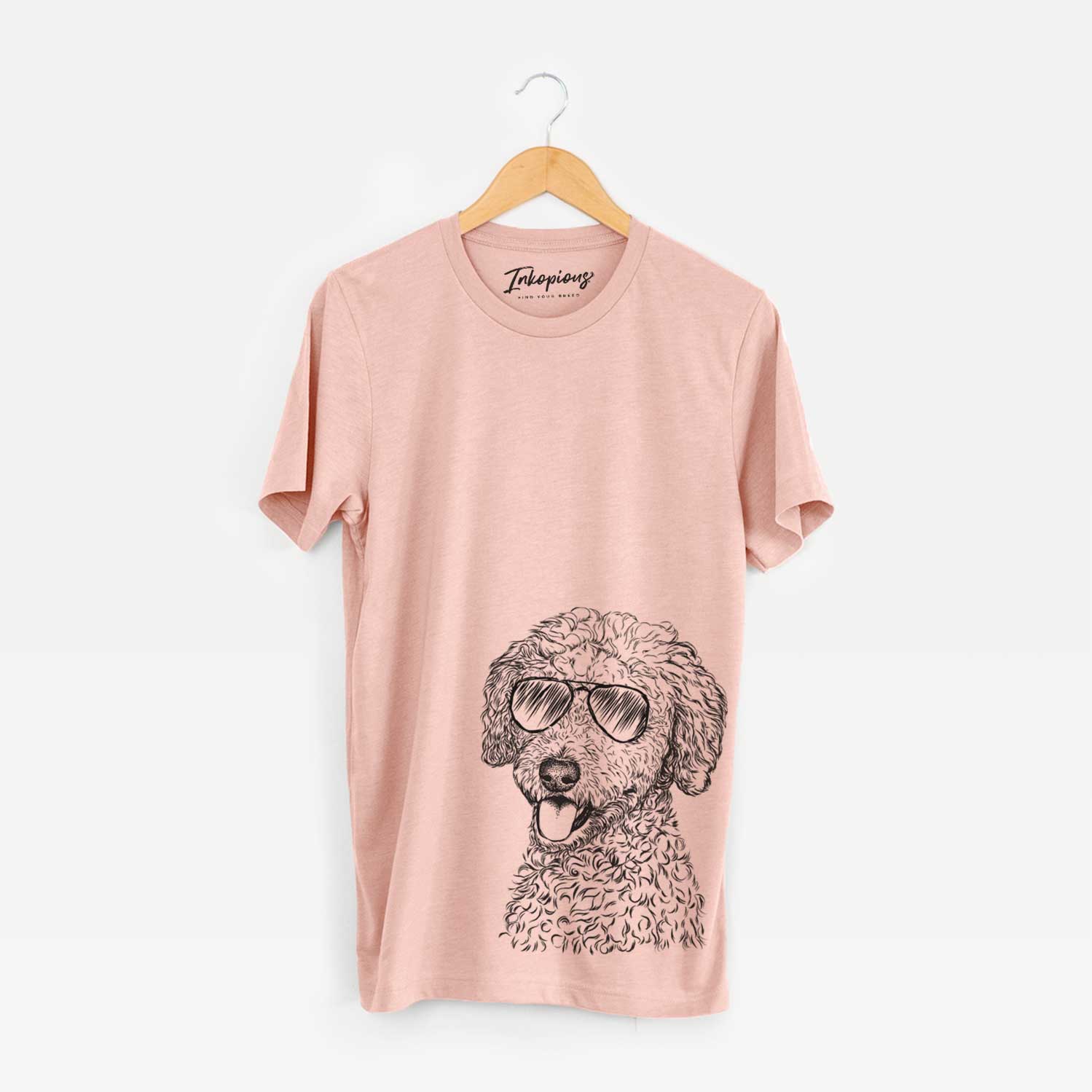 Hand-drawn sketch of Marlow the Goldendoodle wearing aviator sunglasses on a Peach Unisex crewneck