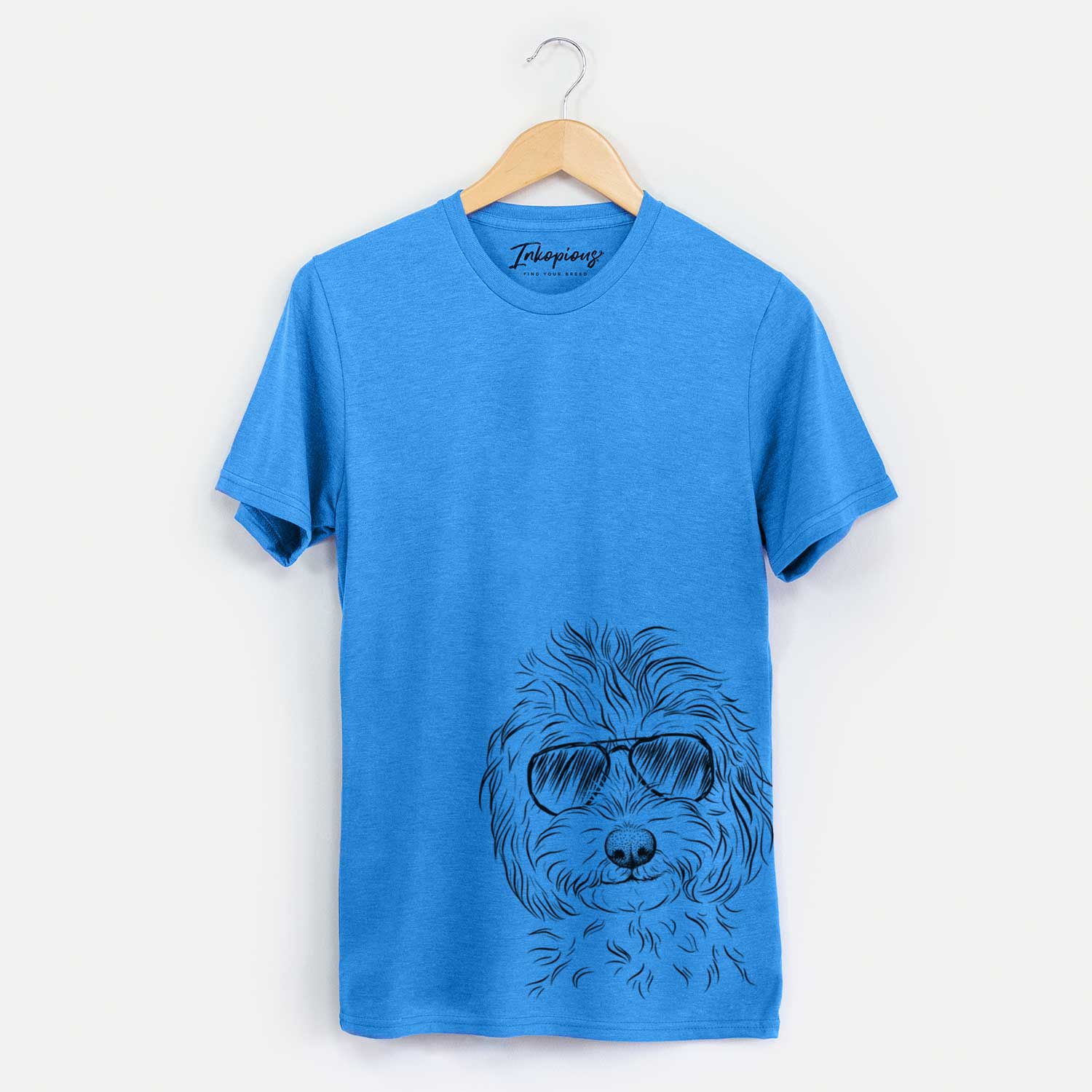 Hand-drawn sketch of Mason the Cavapoo wearing aviator sunglasses on a Blue Unisex crewneck