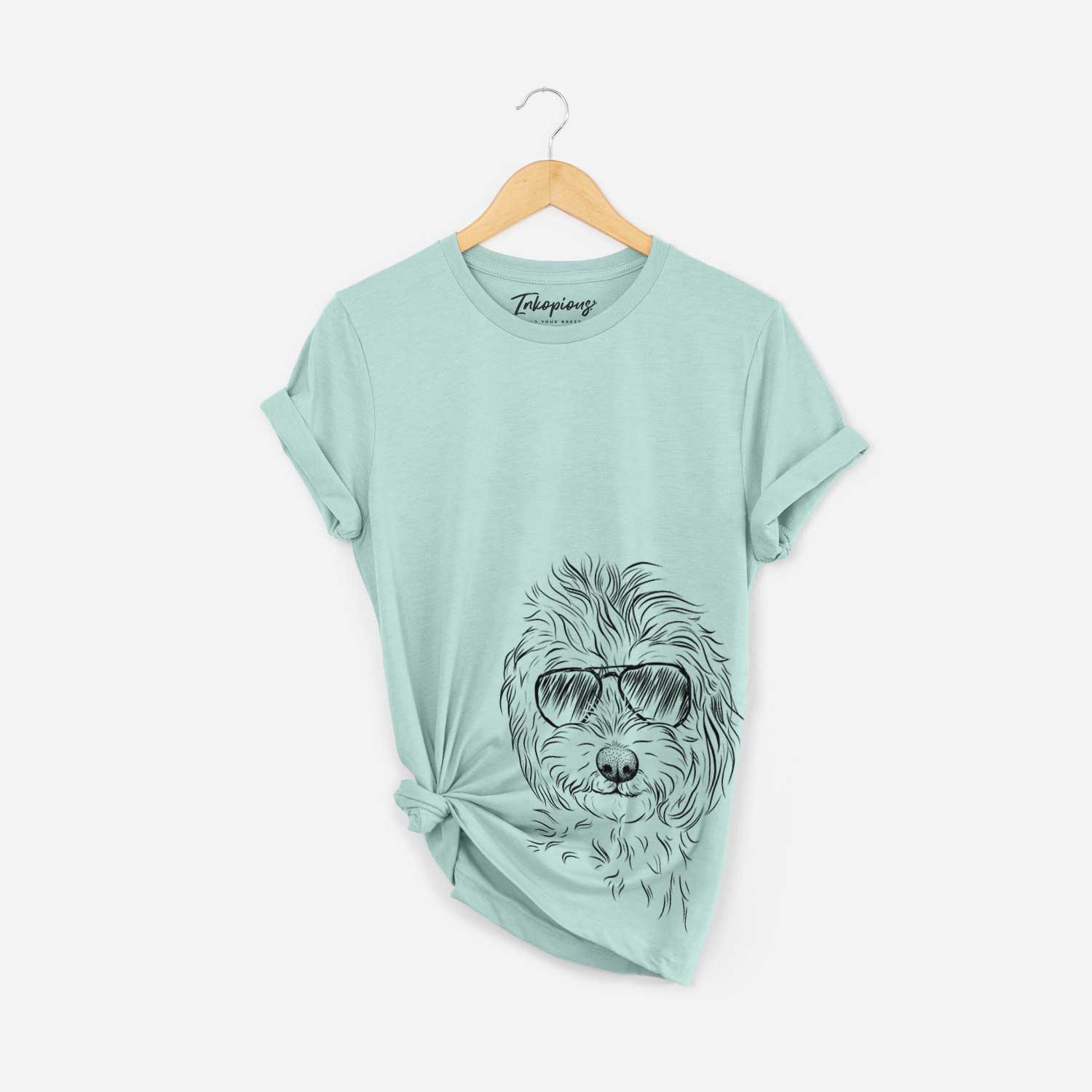 Hand-drawn sketch of Mason the Cavapoo wearing aviator sunglasses on a Heather Sage Bella Canvas Unisex Crewneck