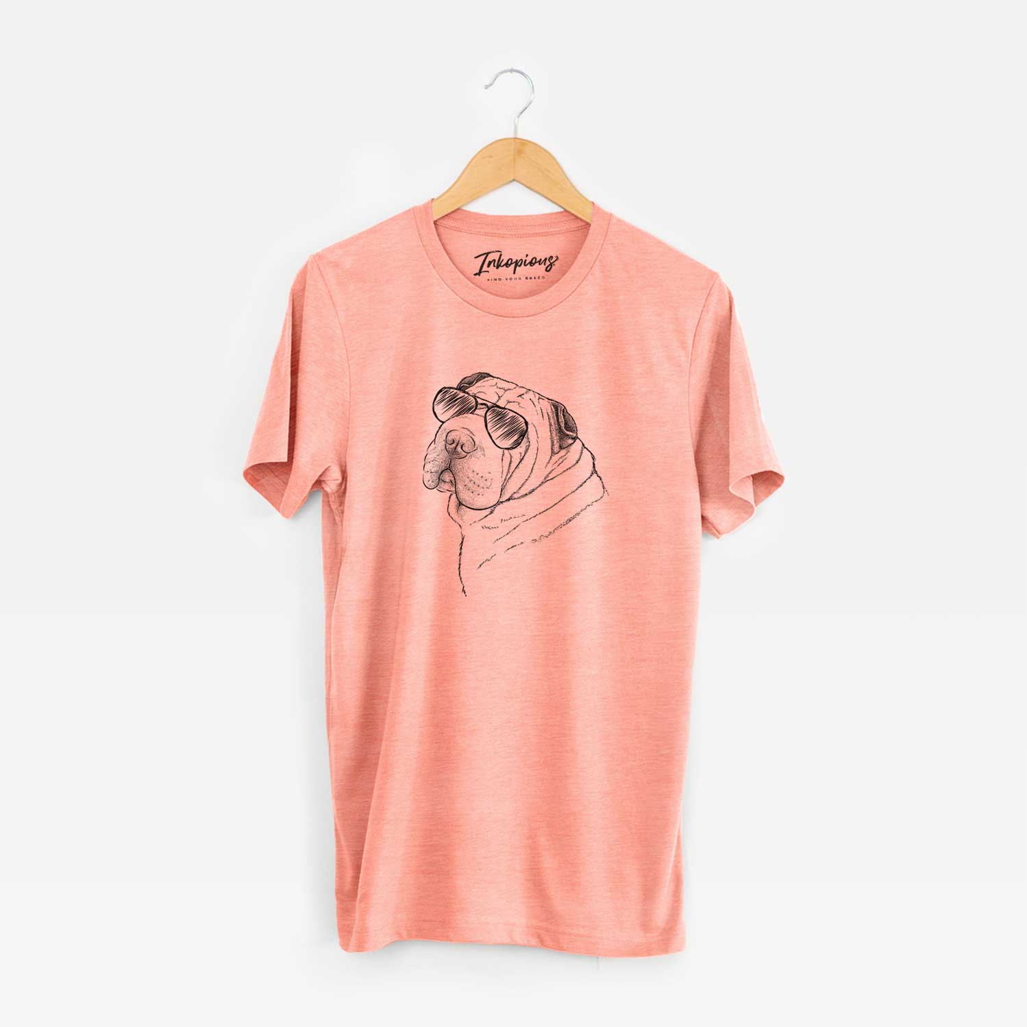Hand-drawn sketch of Maximus the Shar Pei wearing aviator sunglasses on a Sunset Unisex crewneck