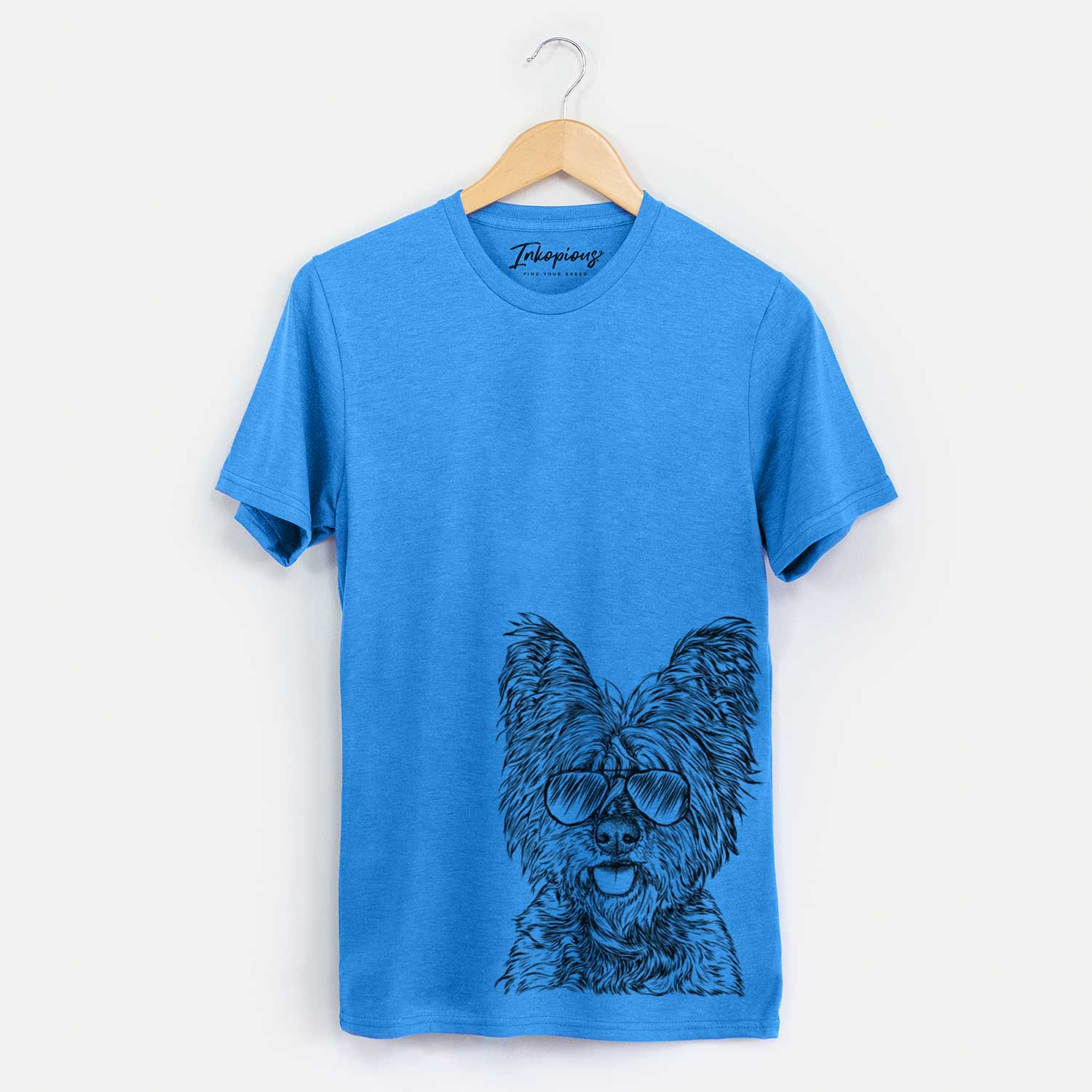 Hand-drawn sketch of McDuff the Cairn Terrier wearing aviator sunglasses on a Blue Unisex crewneck