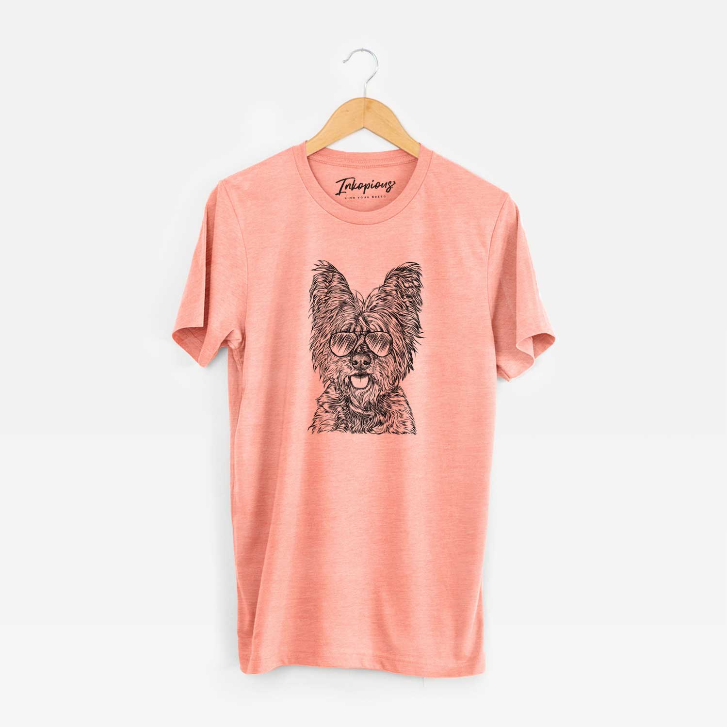 Hand-drawn sketch of McDuff the Cairn Terrier wearing aviator sunglasses on a Sunset Unisex crewneck