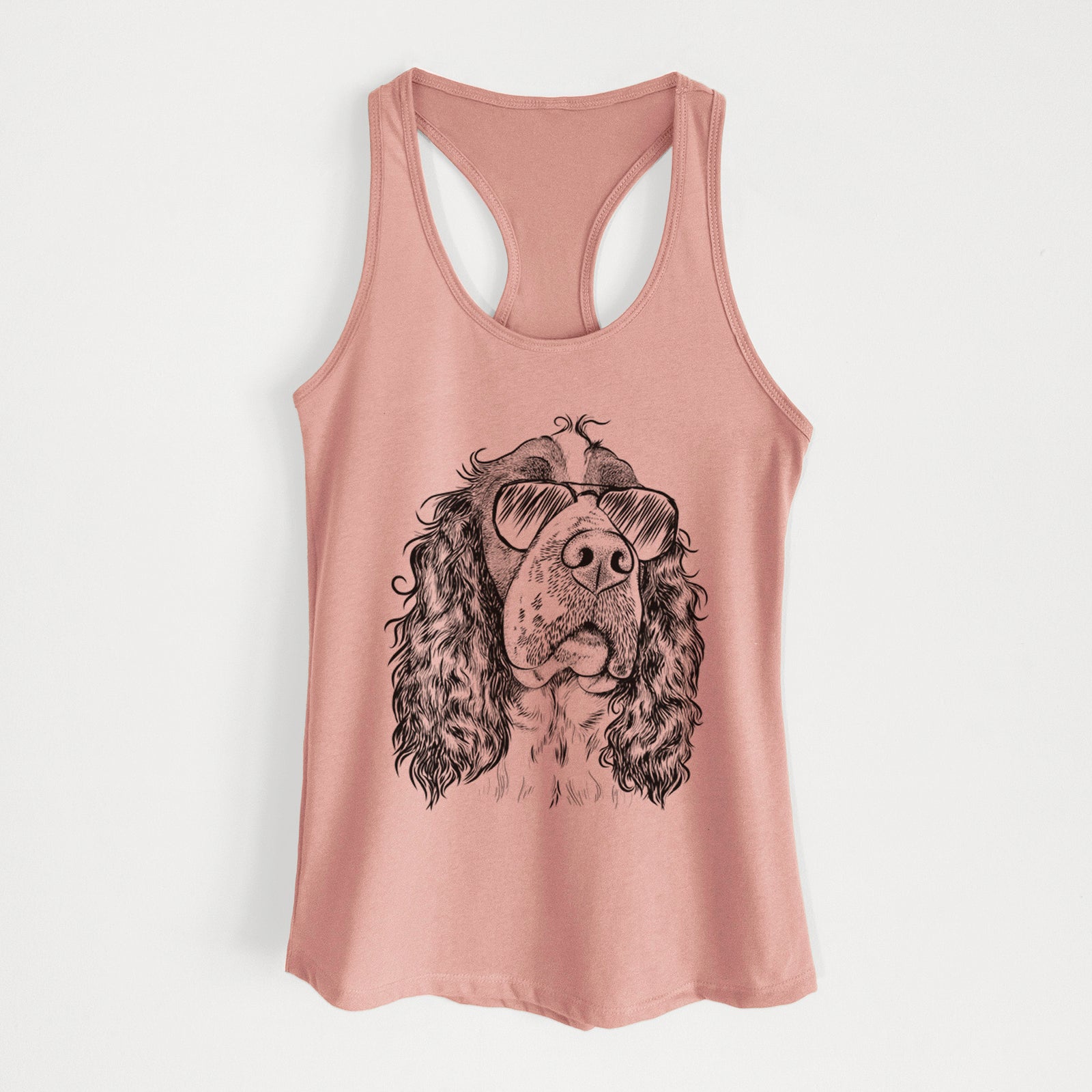 Hand-drawn sketch of Millie Mae the English Springer Spaniel wearing aviator sunglasses on a Desert Pink Women's racerback tanktop