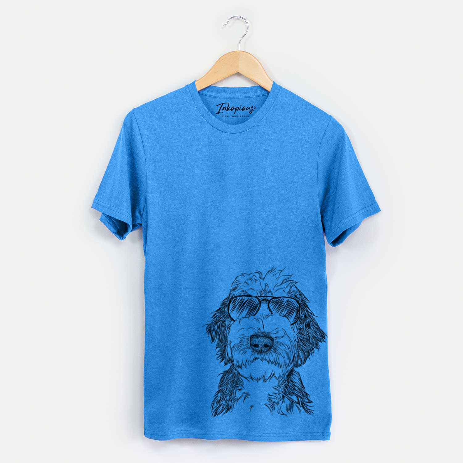 Hand-drawn sketch of Milo Fluff the Sheepadoodle wearing aviator sunglasses on a Blue Unisex crewneck