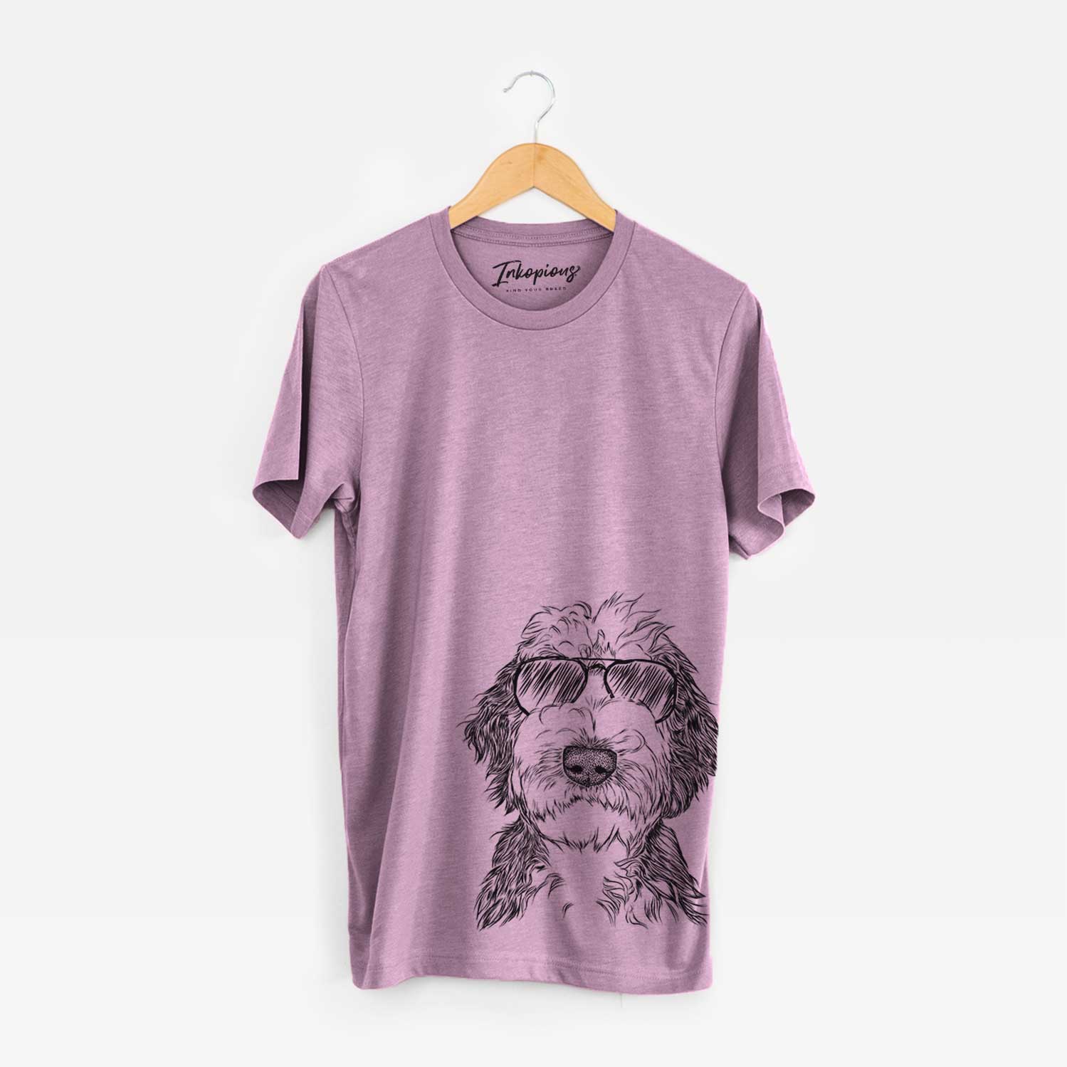 Hand-drawn sketch of Milo Fluff the Sheepadoodle wearing aviator sunglasses on an Orchid Bella Canvas Unisex Crewneck