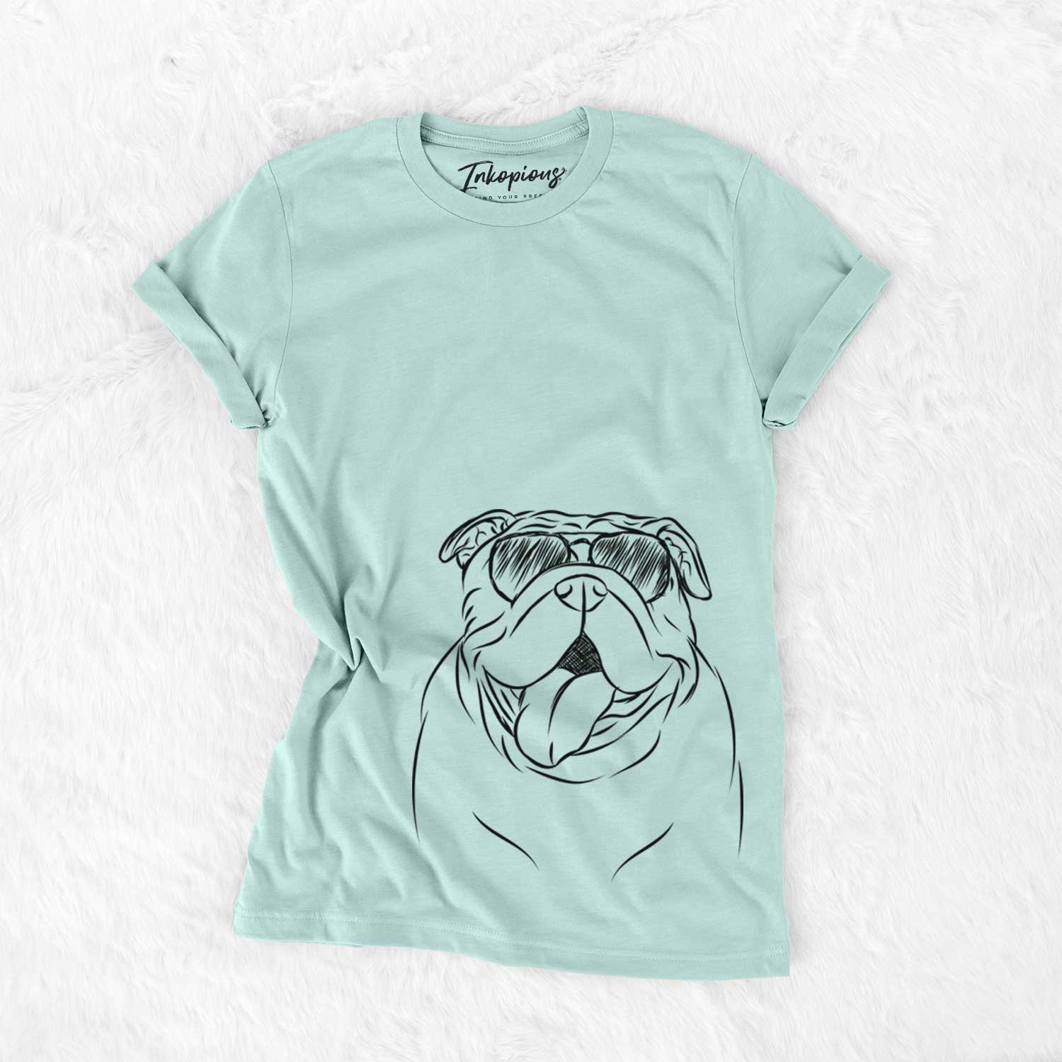 Hand-drawn sketch of Missy Moo the English Bulldog wearing aviator sunglasses on a Heather Sage Unisex crewneck