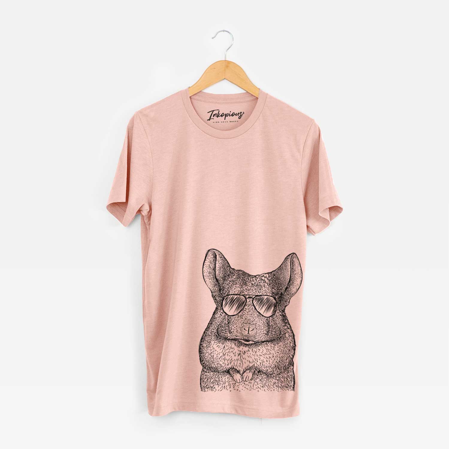 Hand-drawn sketch of Mojo the Chinchilla wearing aviator sunglasses on a Peach Bella Canvas Unisex Crewneck