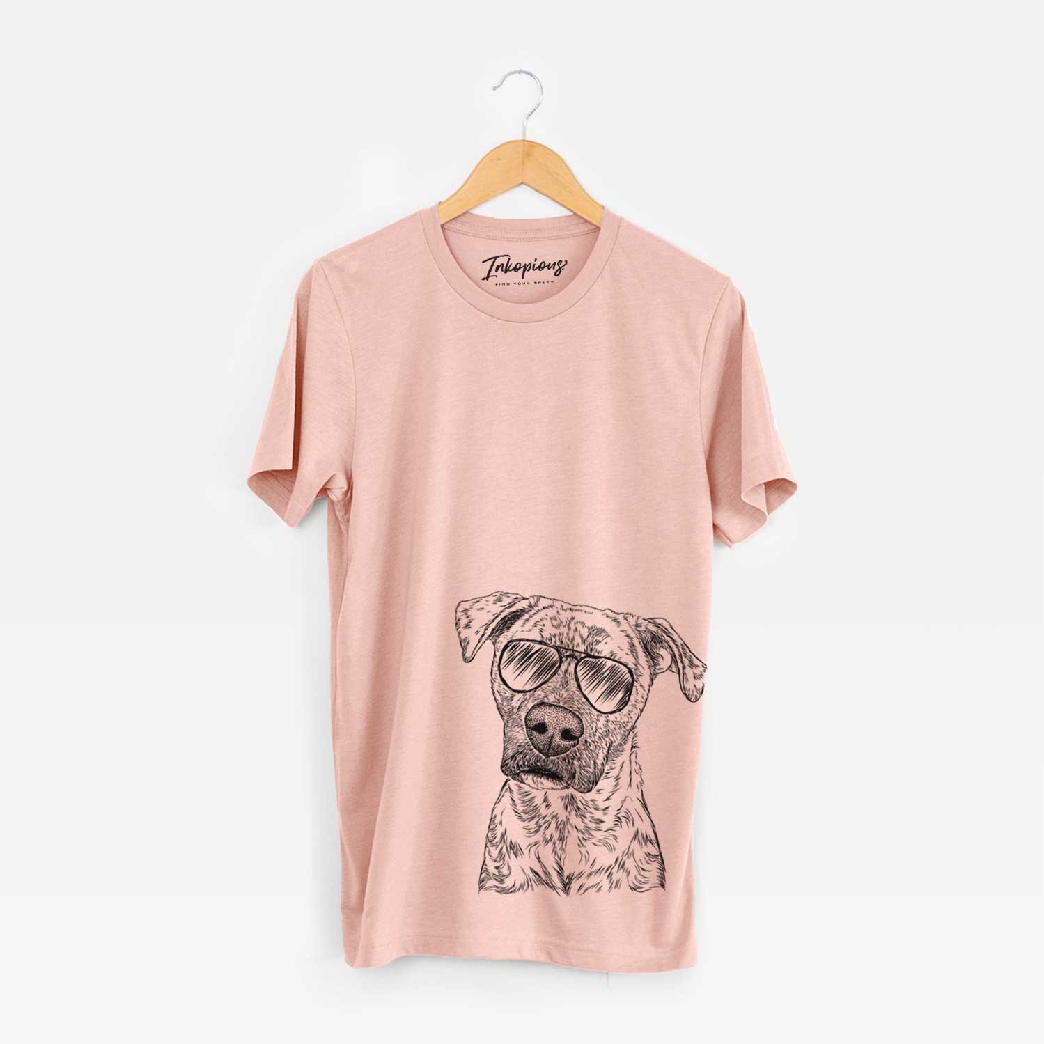 Hand-drawn sketch of Monster Baby the Pitbull Mix wearing aviator sunglasses on a Peach Unisex crewneck