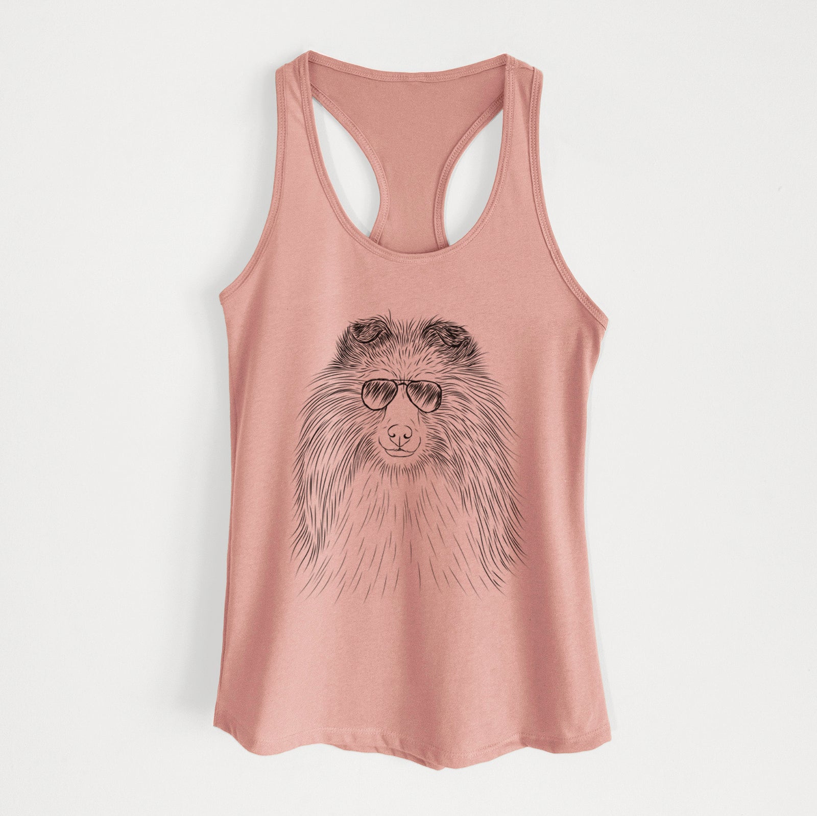 Hand-drawn sketch of Moxie the Shetland Sheepdog wearing aviator sunglasses on a Desert Pink Women's racerback tanktop