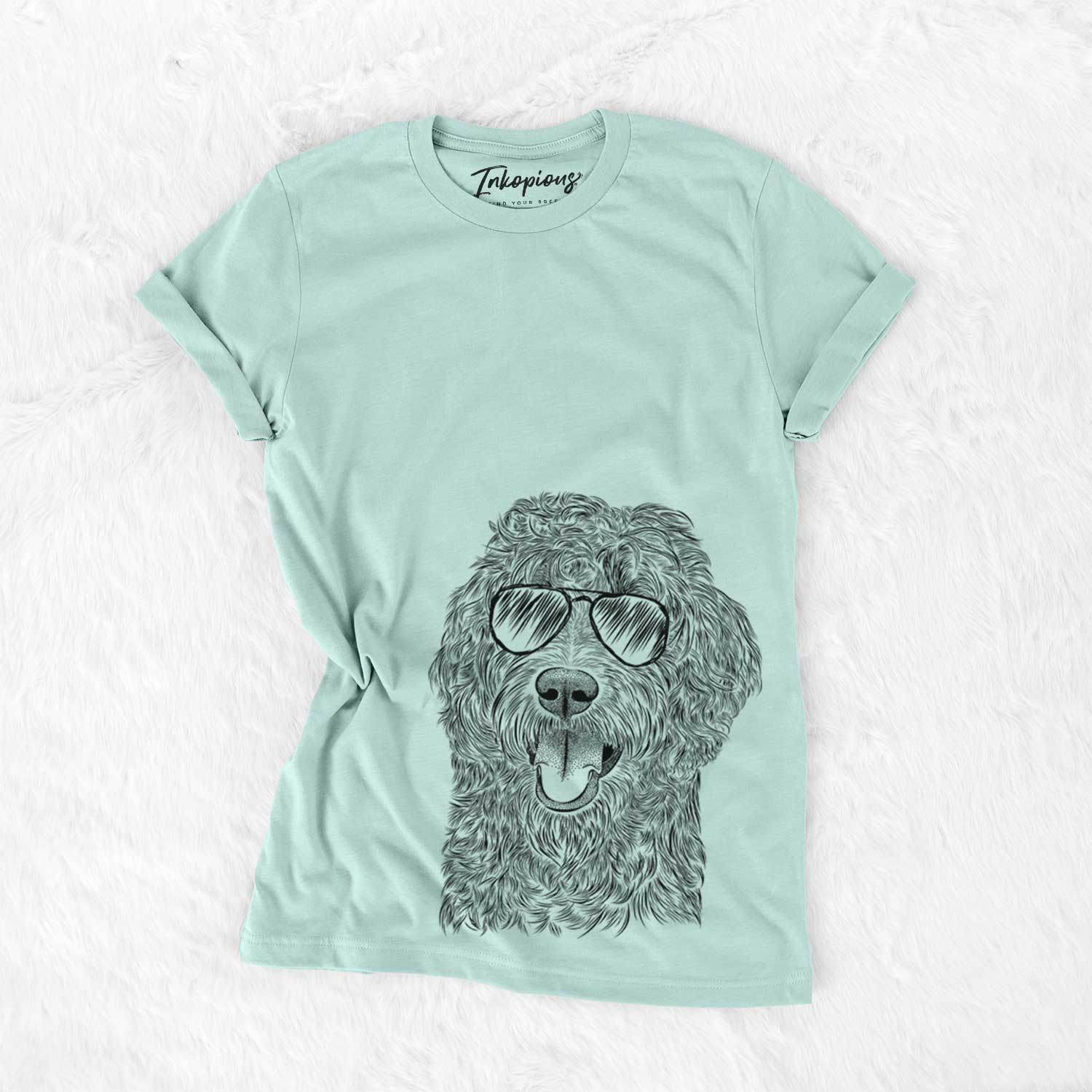 Hand-drawn sketch of Murr Dog the Labradoodle wearing aviator sunglasses on a Heather Sage Unisex crewneck