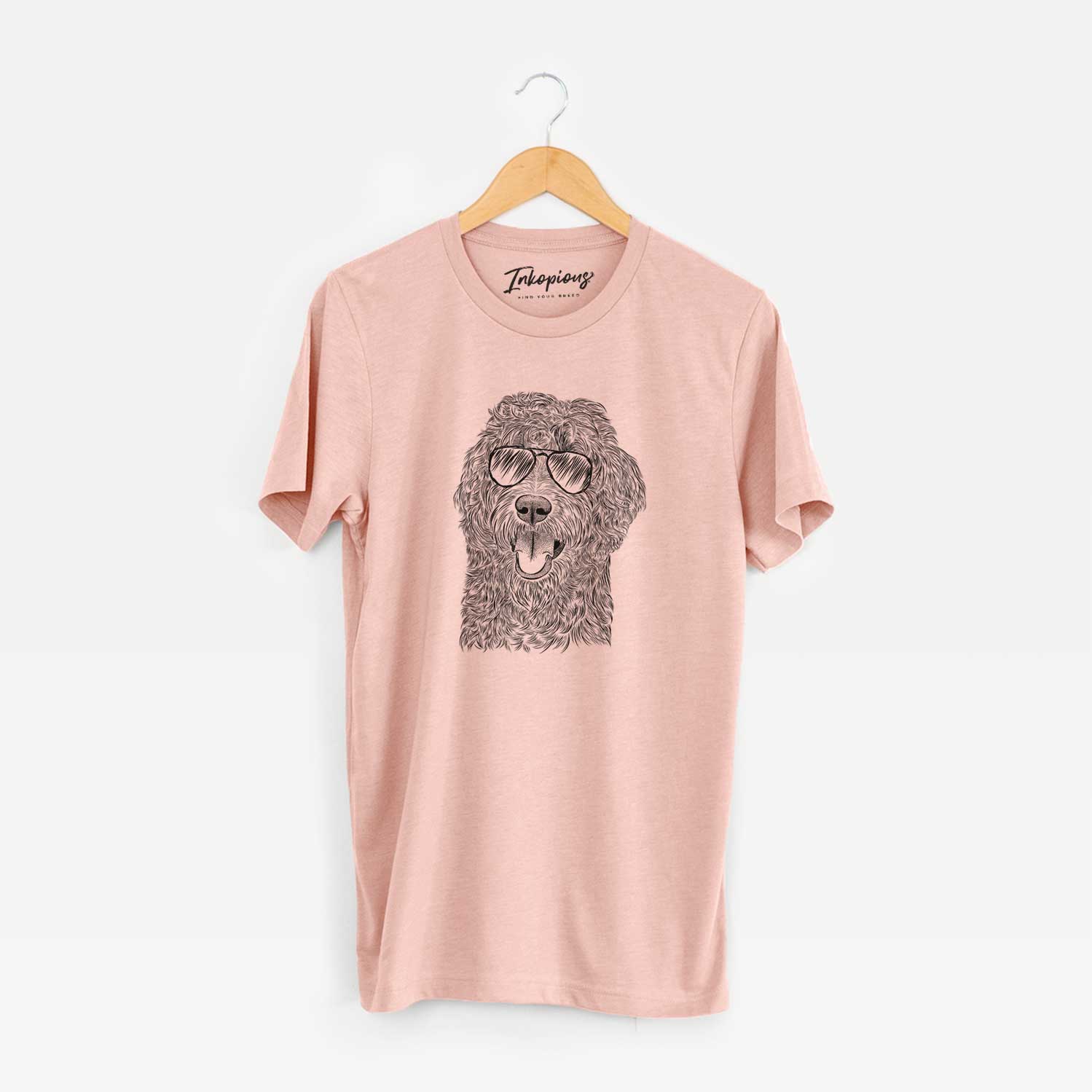 Hand-drawn sketch of Murr Dog the Labradoodle wearing aviator sunglasses on a Peach Unisex crewneck