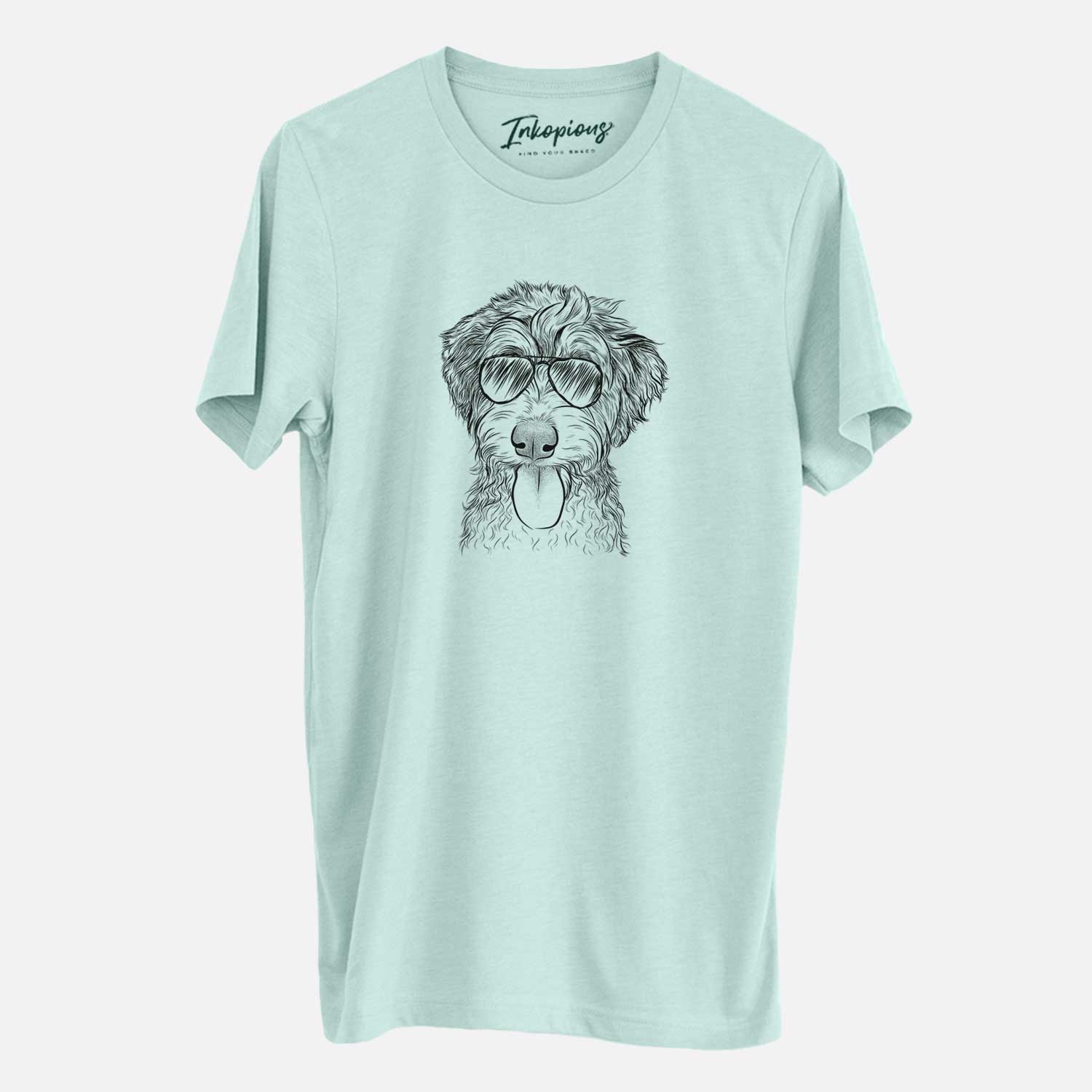 Hand-drawn sketch of Myrtle Mae the Aussiedoodle wearing aviator sunglasses on a Heather Sage Unisex crewneck