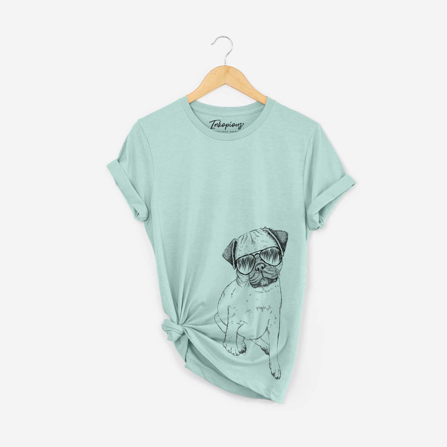 Hand-drawn sketch of Nelson the Pug Puppy wearing aviator sunglasses on a Heather Sage Bella Canvas Unisex Crewneck