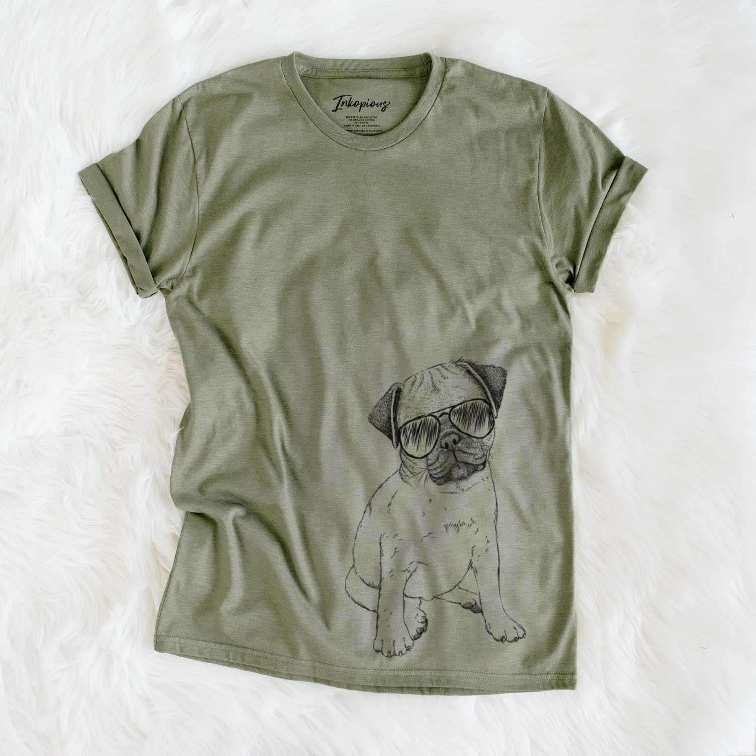 Hand-drawn sketch of Nelson the Pug Puppy wearing aviator sunglasses on an Olive Unisex crewneck
