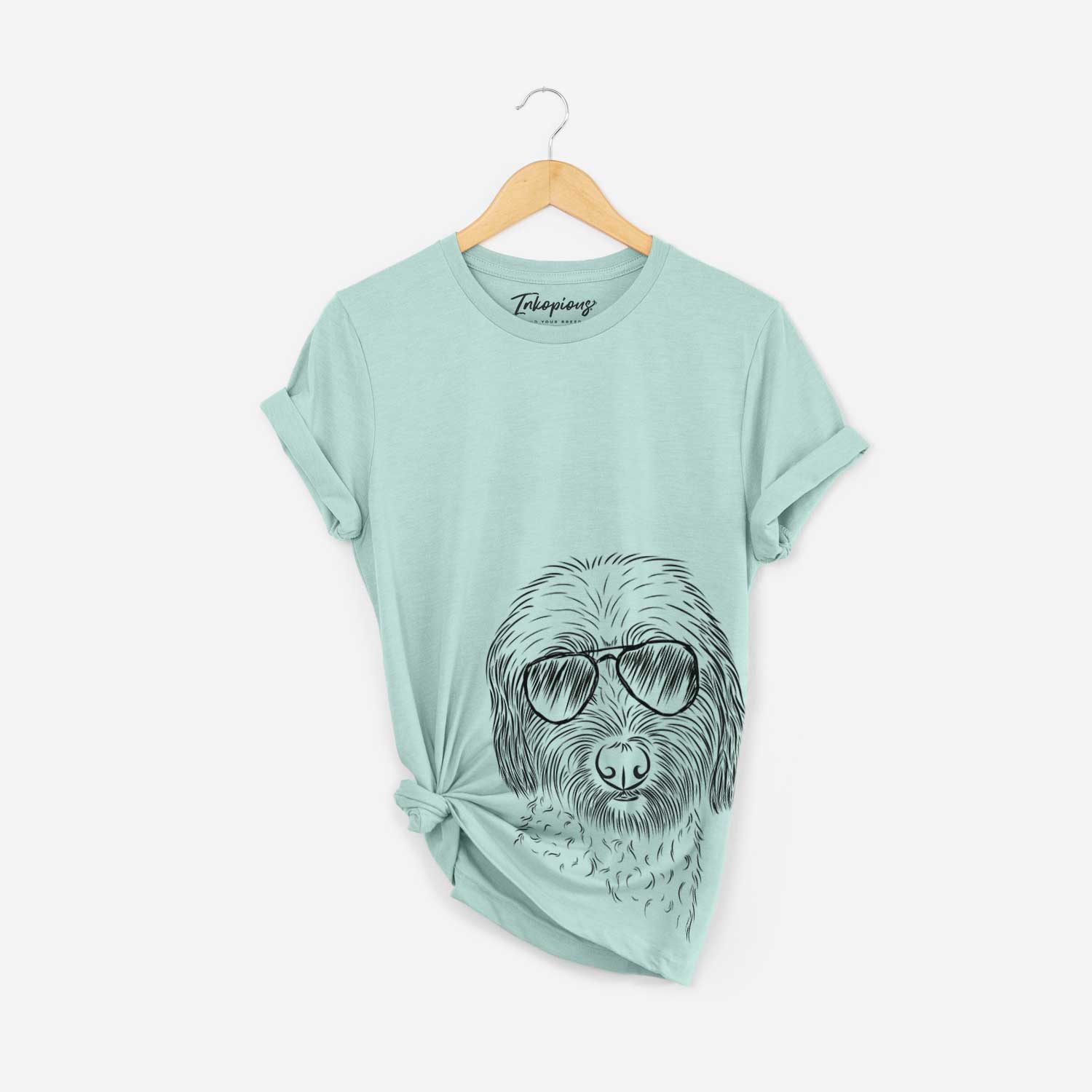 Hand-drawn sketch of Niles the Soft Coated Wheaten Terrier wearing aviator sunglasses on a Heather Sage Bella Canvas Unisex Crewneck