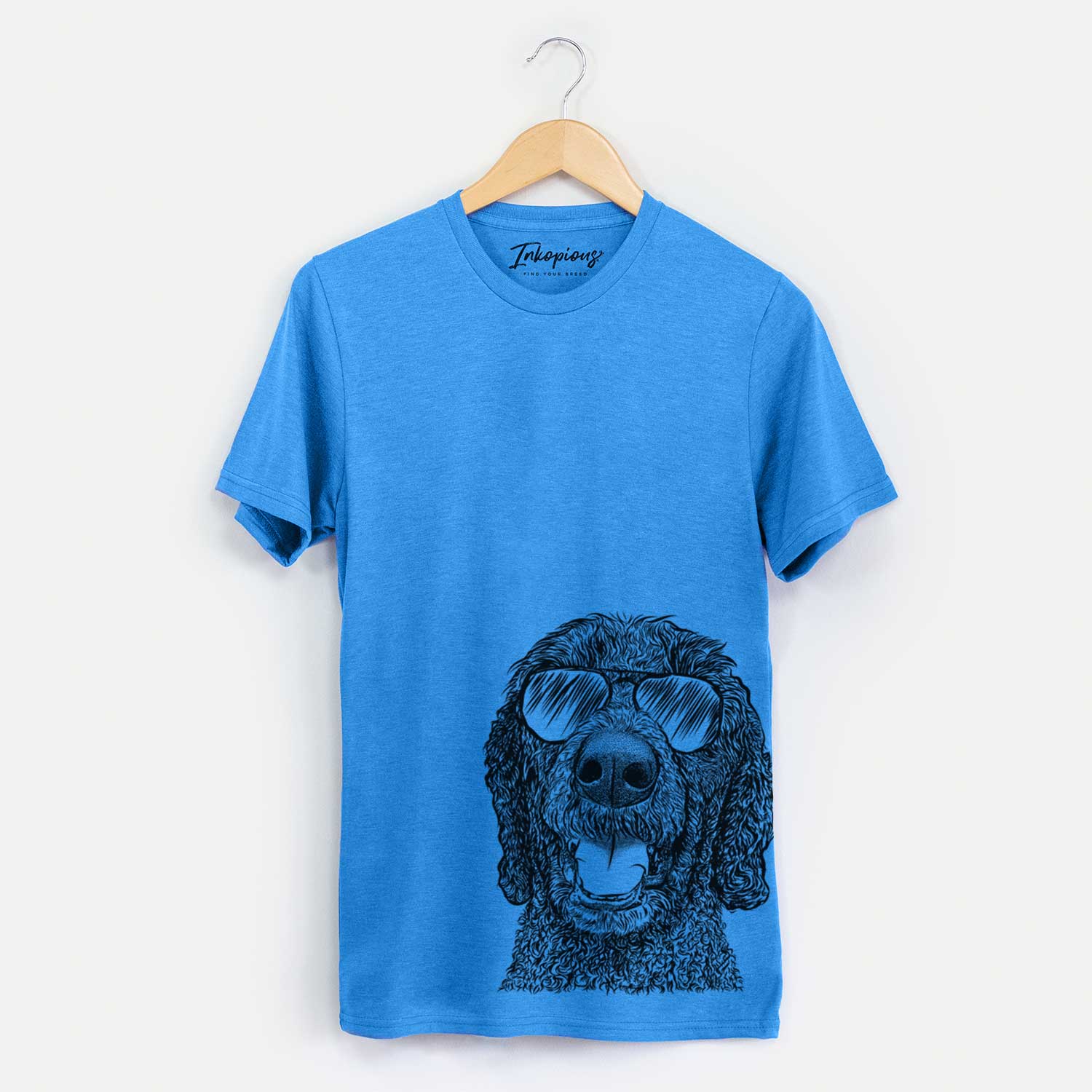 Hand-drawn sketch of Obi James the Goldendoodle wearing aviator sunglasses on a Blue Unisex crewneck