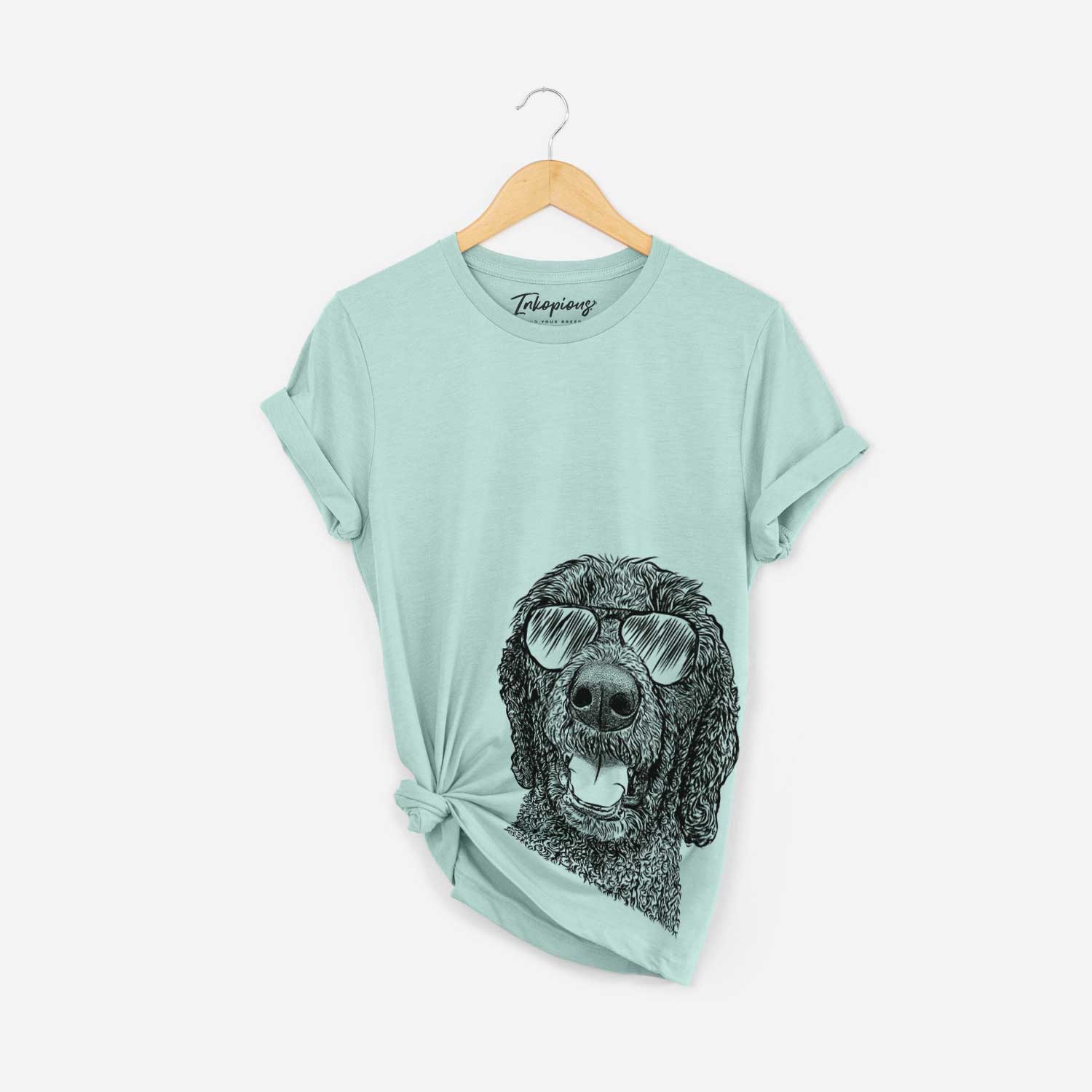 Hand-drawn sketch of Obi James the Goldendoodle wearing aviator sunglasses on a Heather Sage Bella Canvas Unisex Crewneck