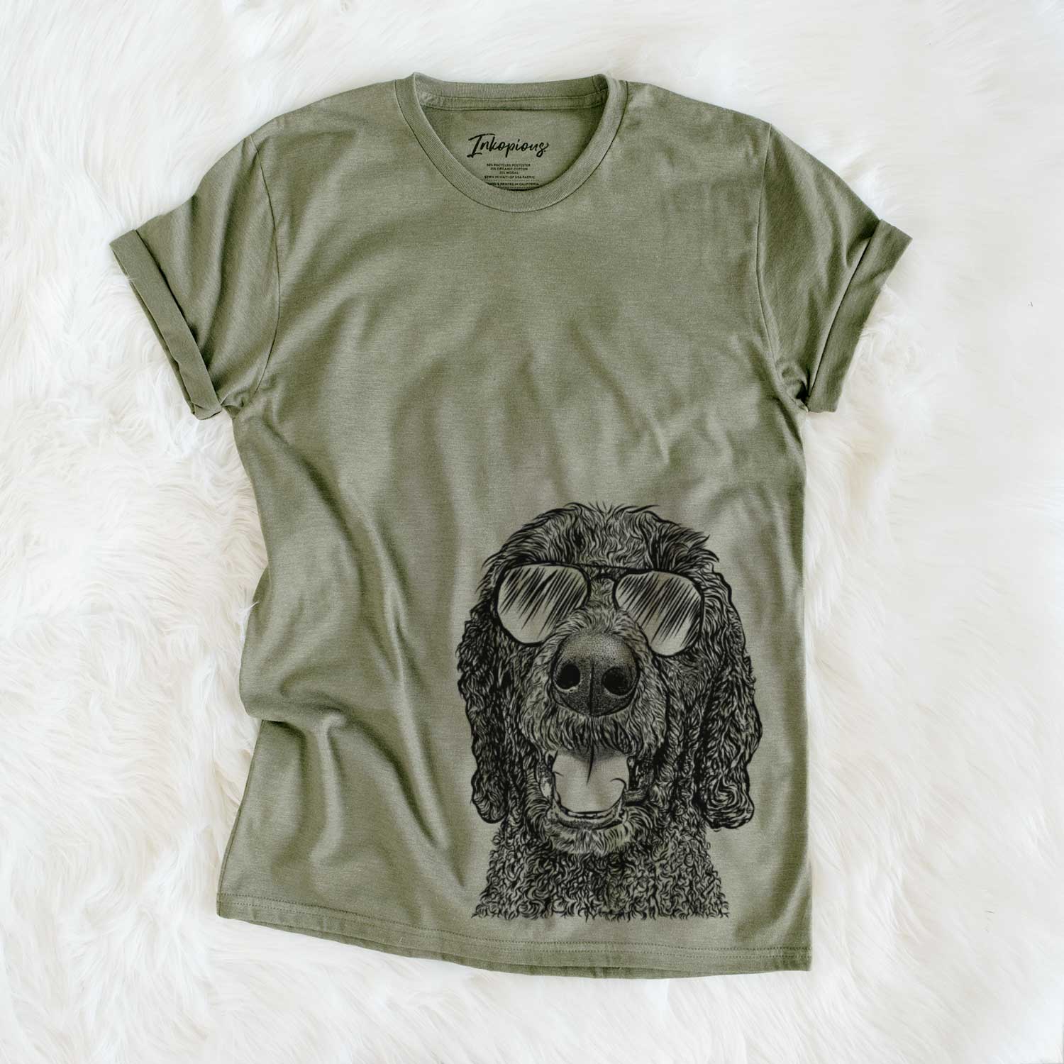Hand-drawn sketch of Obi James the Goldendoodle wearing aviator sunglasses on an Olive Unisex crewneck