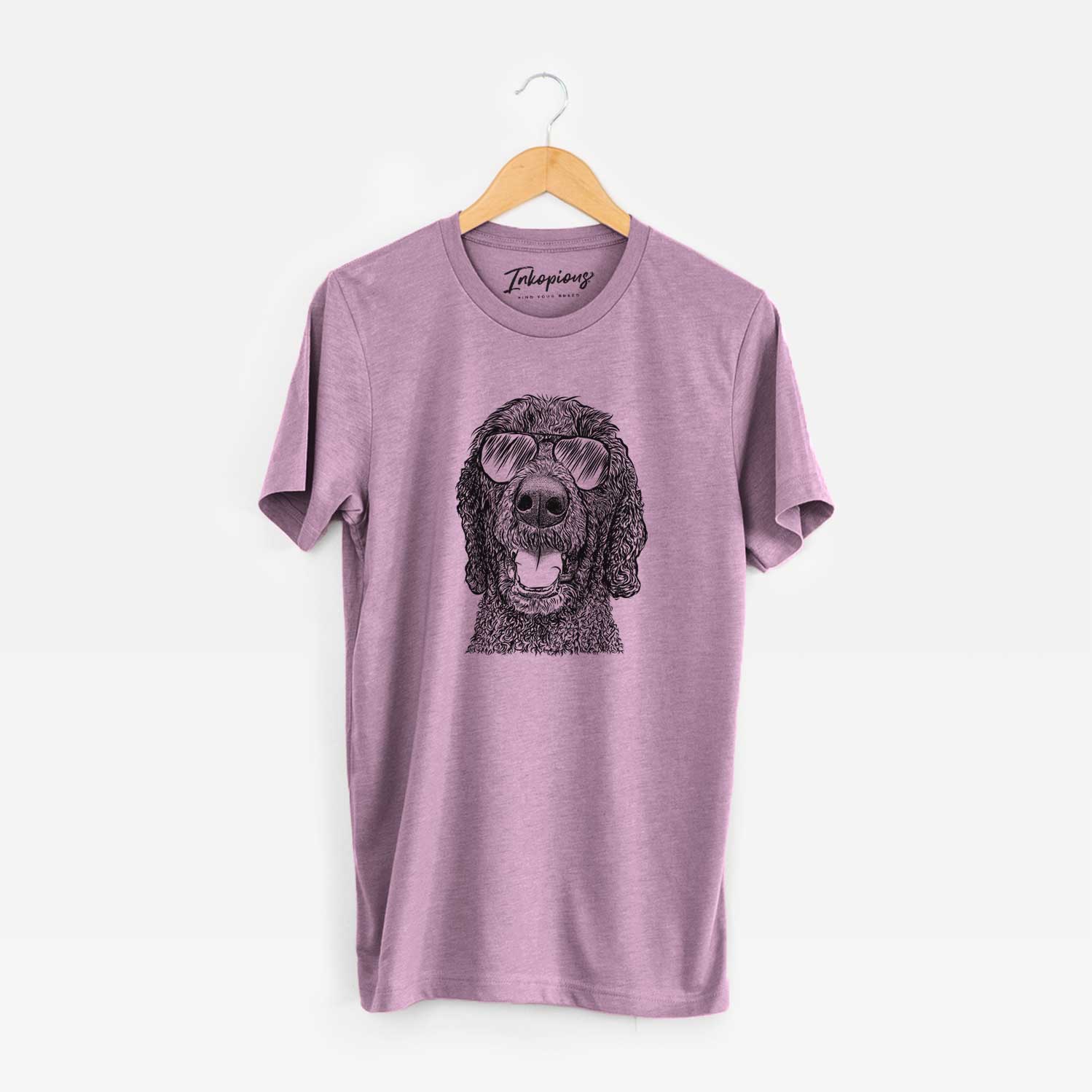 Hand-drawn sketch of Obi James the Goldendoodle wearing aviator sunglasses on an Orchid Unisex crewneck