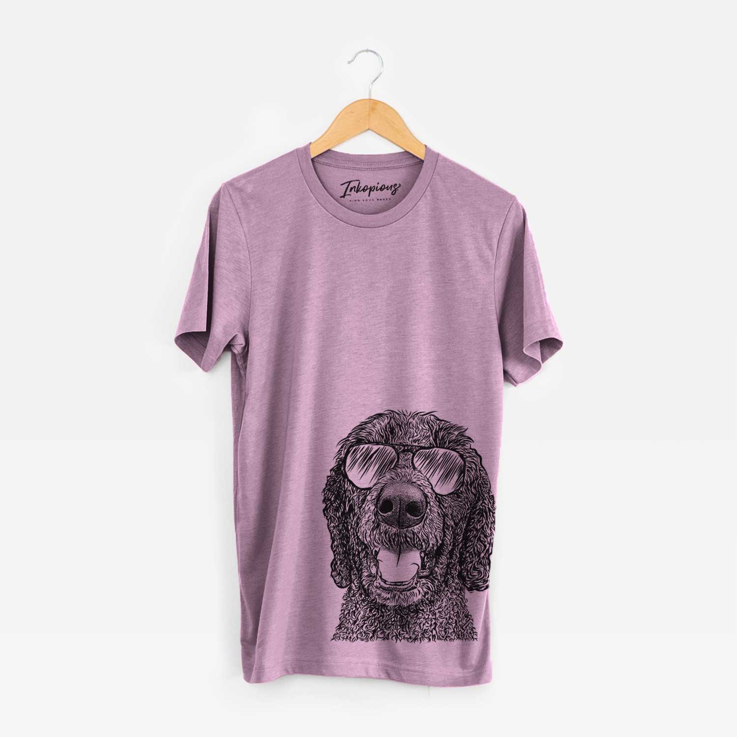 Hand-drawn sketch of Obi James the Goldendoodle wearing aviator sunglasses on an Orchid Bella Canvas Unisex Crewneck