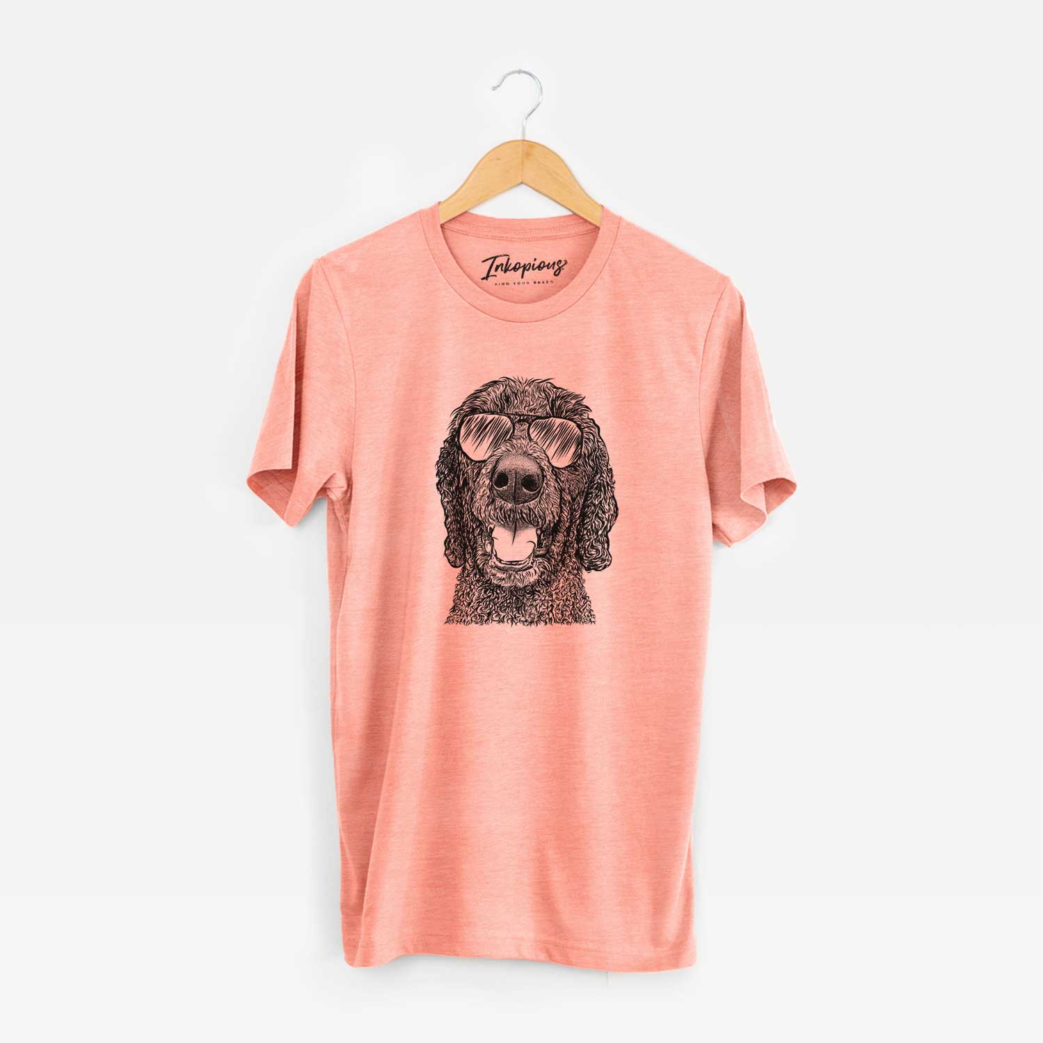 Hand-drawn sketch of Obi James the Goldendoodle wearing aviator sunglasses on a Sunset Unisex crewneck