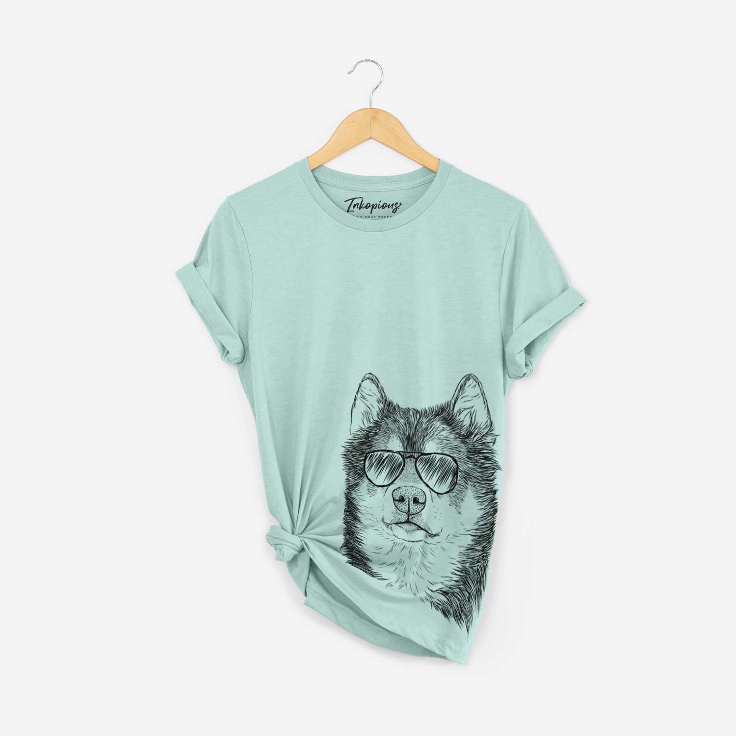 Hand-drawn sketch of Oskar the Canadian Eskimo Dog wearing aviator sunglasses on a Heather Sage Bella Canvas Unisex Crewneck