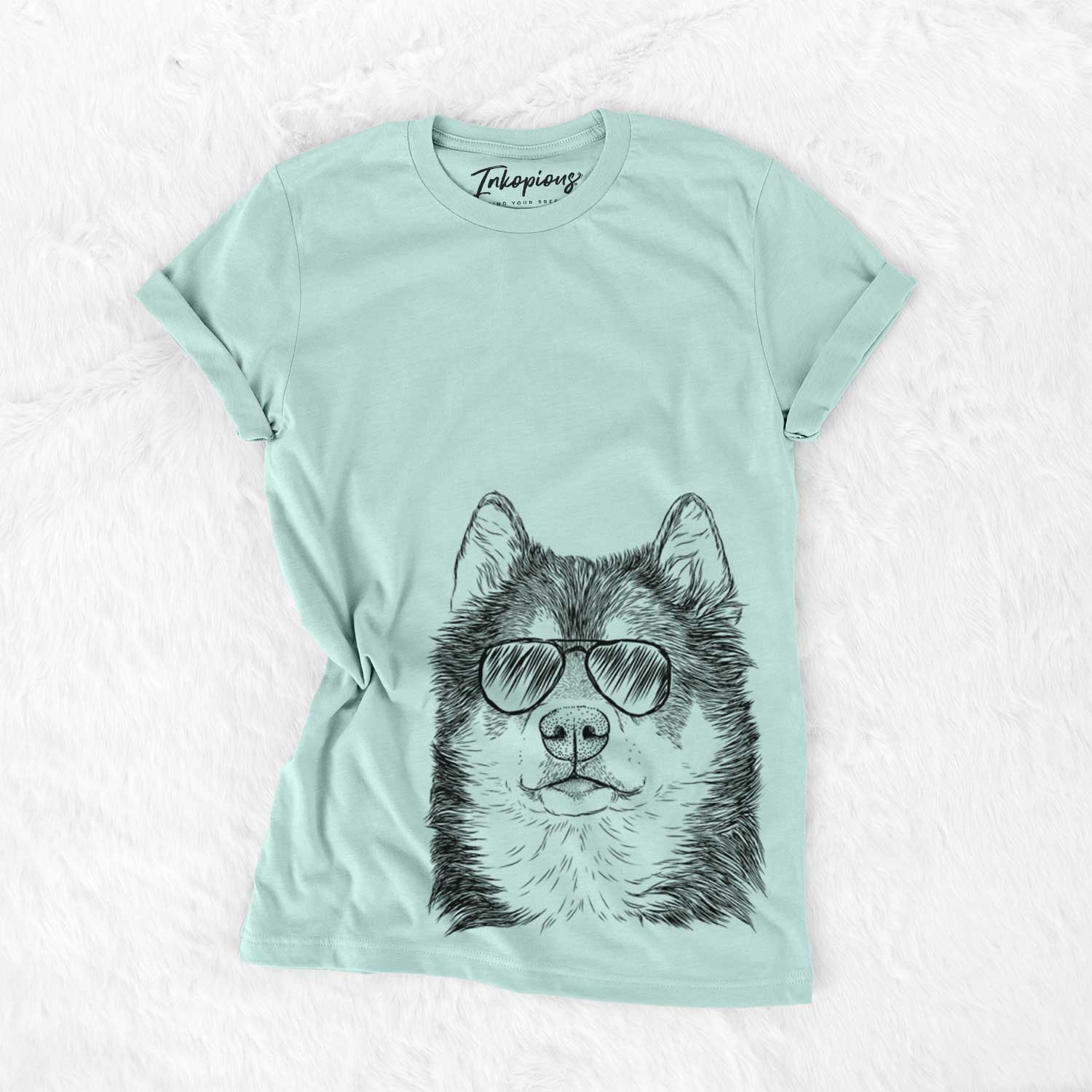 Hand-drawn sketch of Oskar the Canadian Eskimo Dog wearing aviator sunglasses on a Heather Sage Unisex crewneck