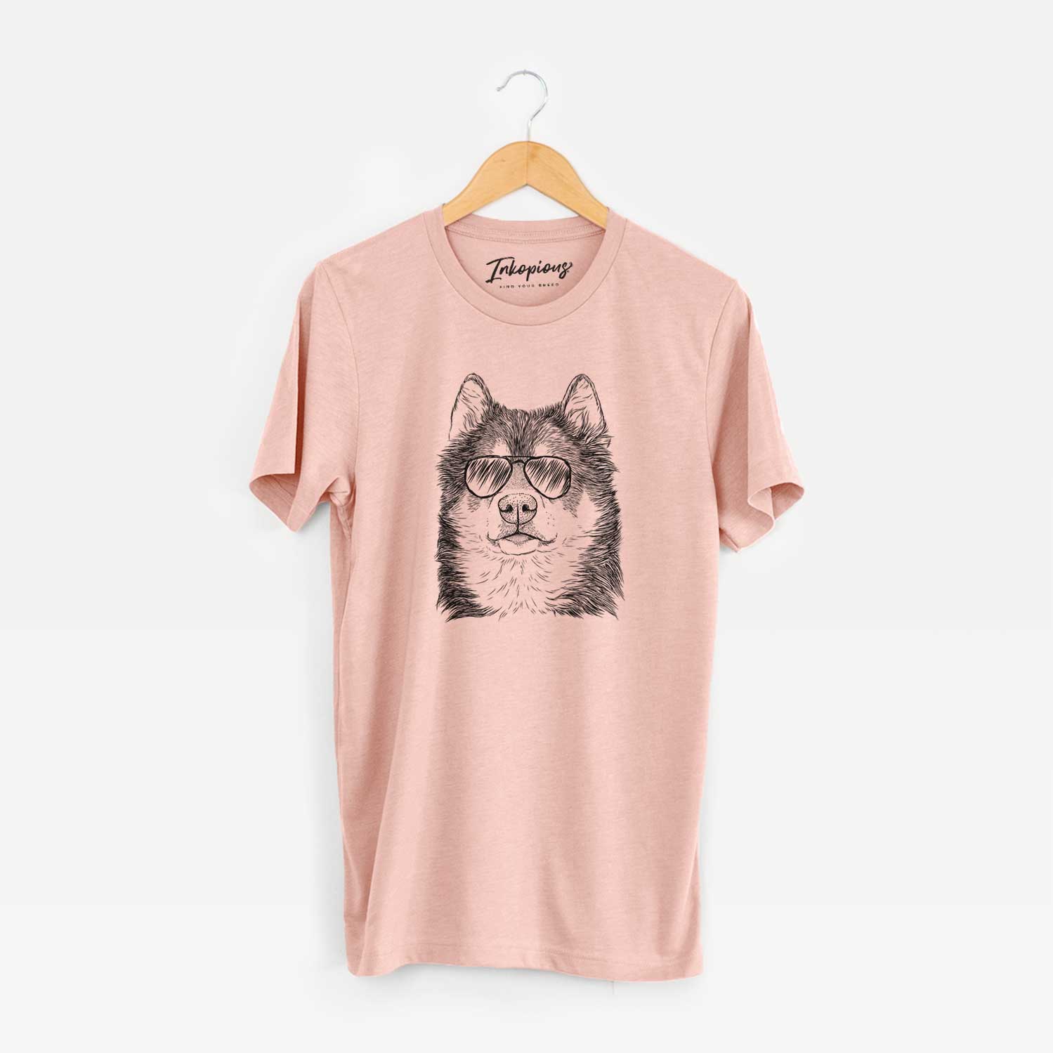 Hand-drawn sketch of Oskar the Canadian Eskimo Dog wearing aviator sunglasses on a Peach Unisex crewneck