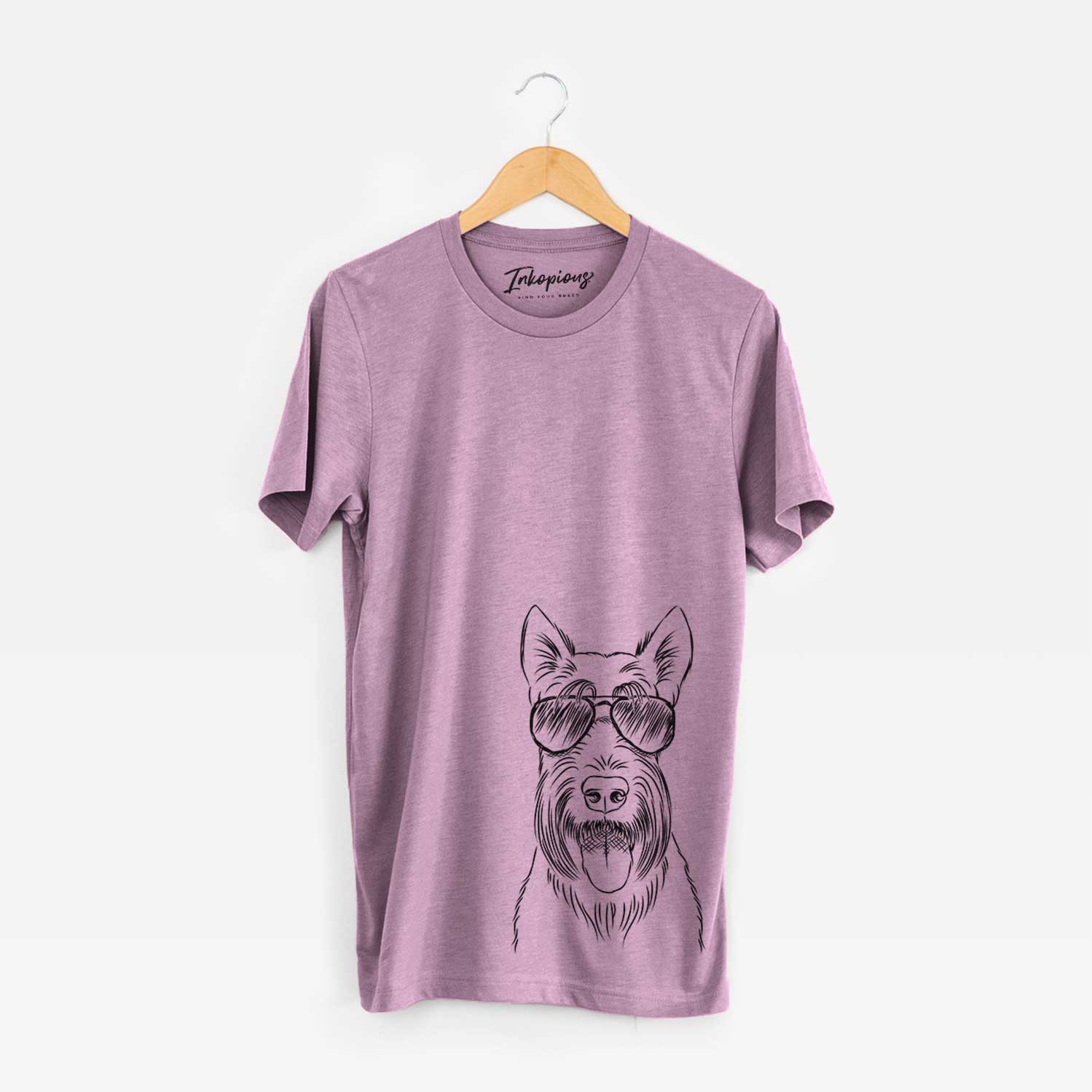 Hand-drawn sketch of Oswald the Scottish Terrier wearing aviator sunglasses on an Orchid Bella Canvas Unisex Crewneck