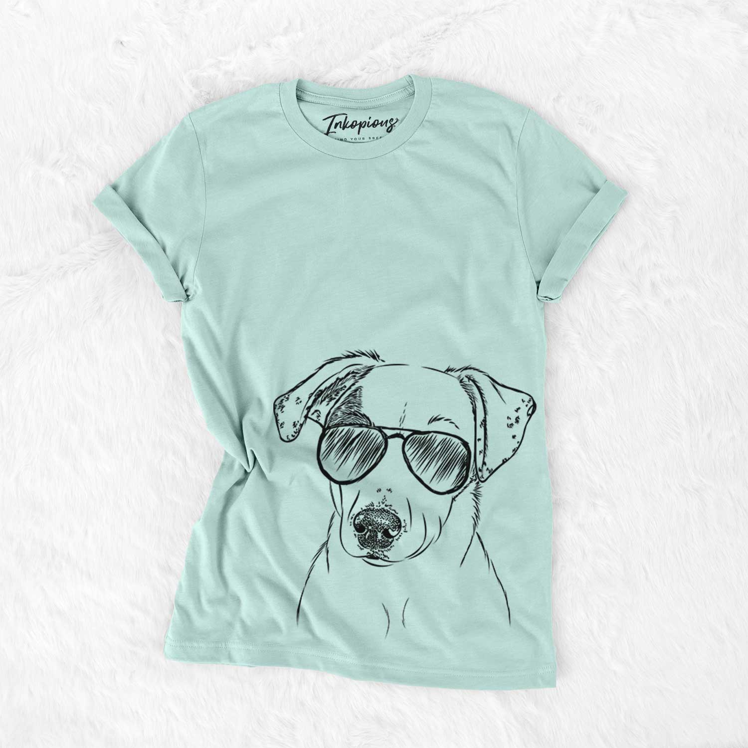 Hand-drawn sketch of P-Pie the Mixed Breed wearing aviator sunglasses on a Heather Sage Unisex crewneck