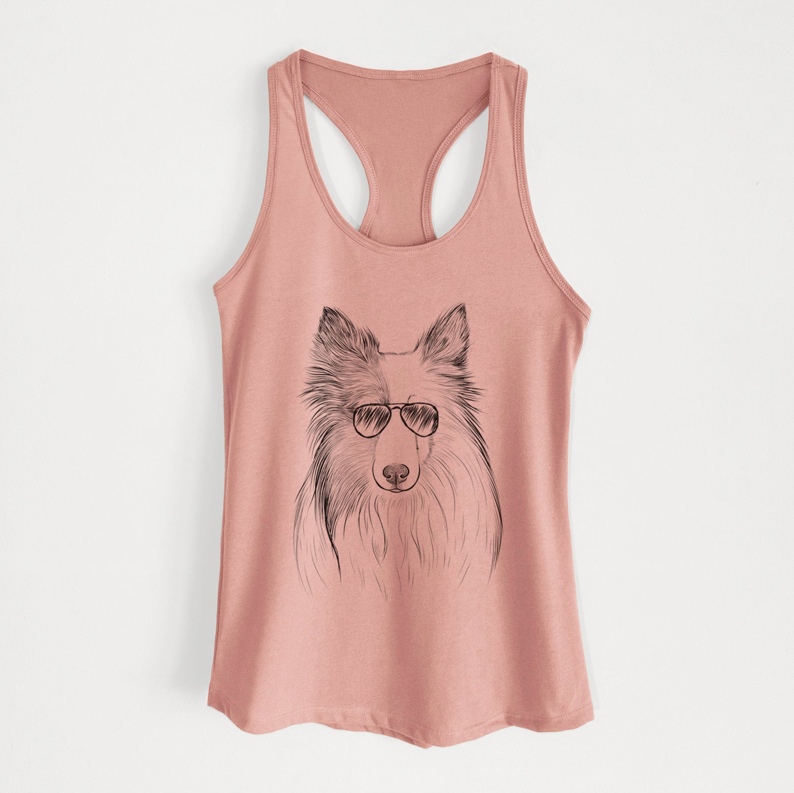Hand-drawn sketch of Palin the Shetland Sheepdog wearing aviator sunglasses on a Desert Pink Women's racerback tanktop