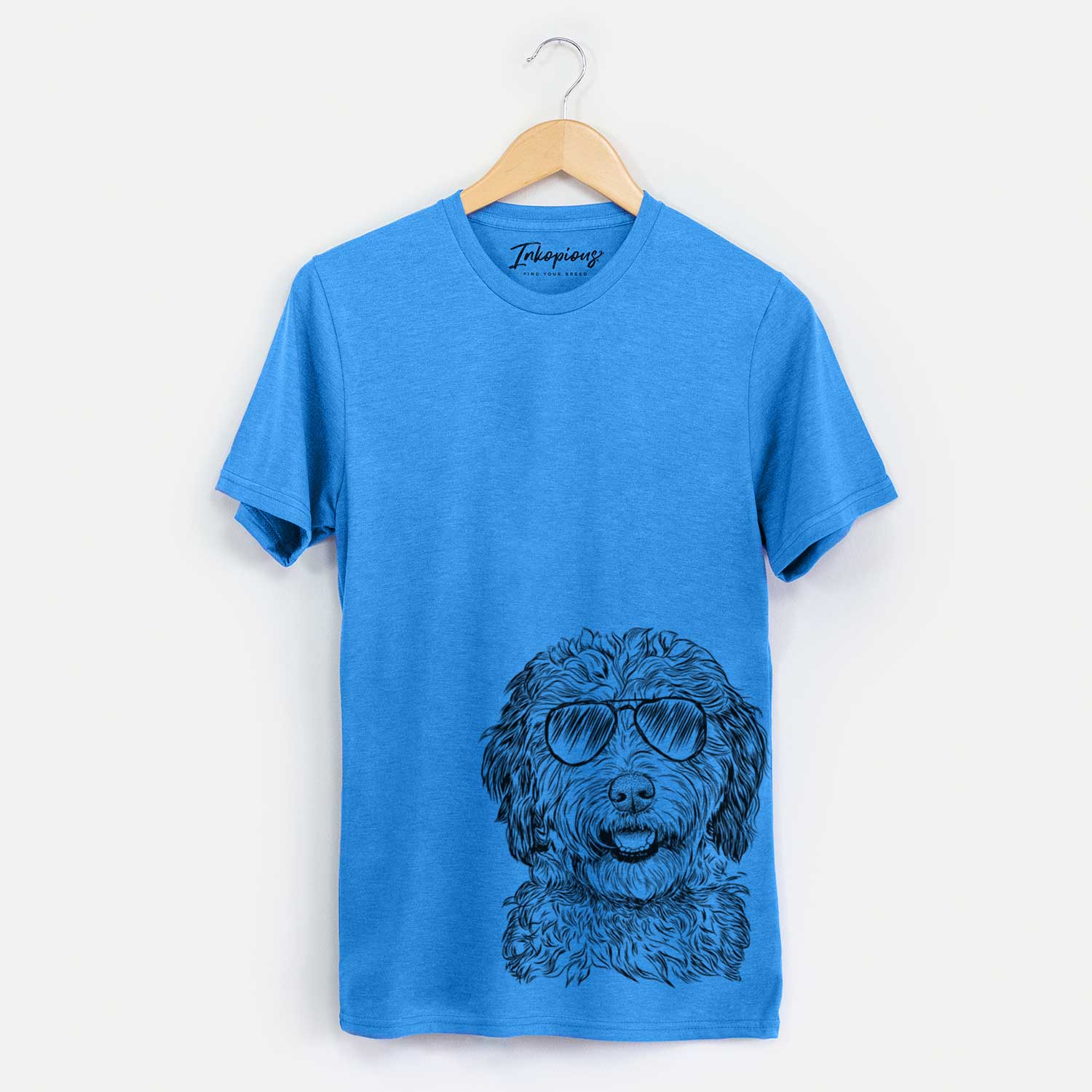 Hand-drawn sketch of Palmer the Aussiedoodle wearing aviator sunglasses on a Blue Unisex crewneck