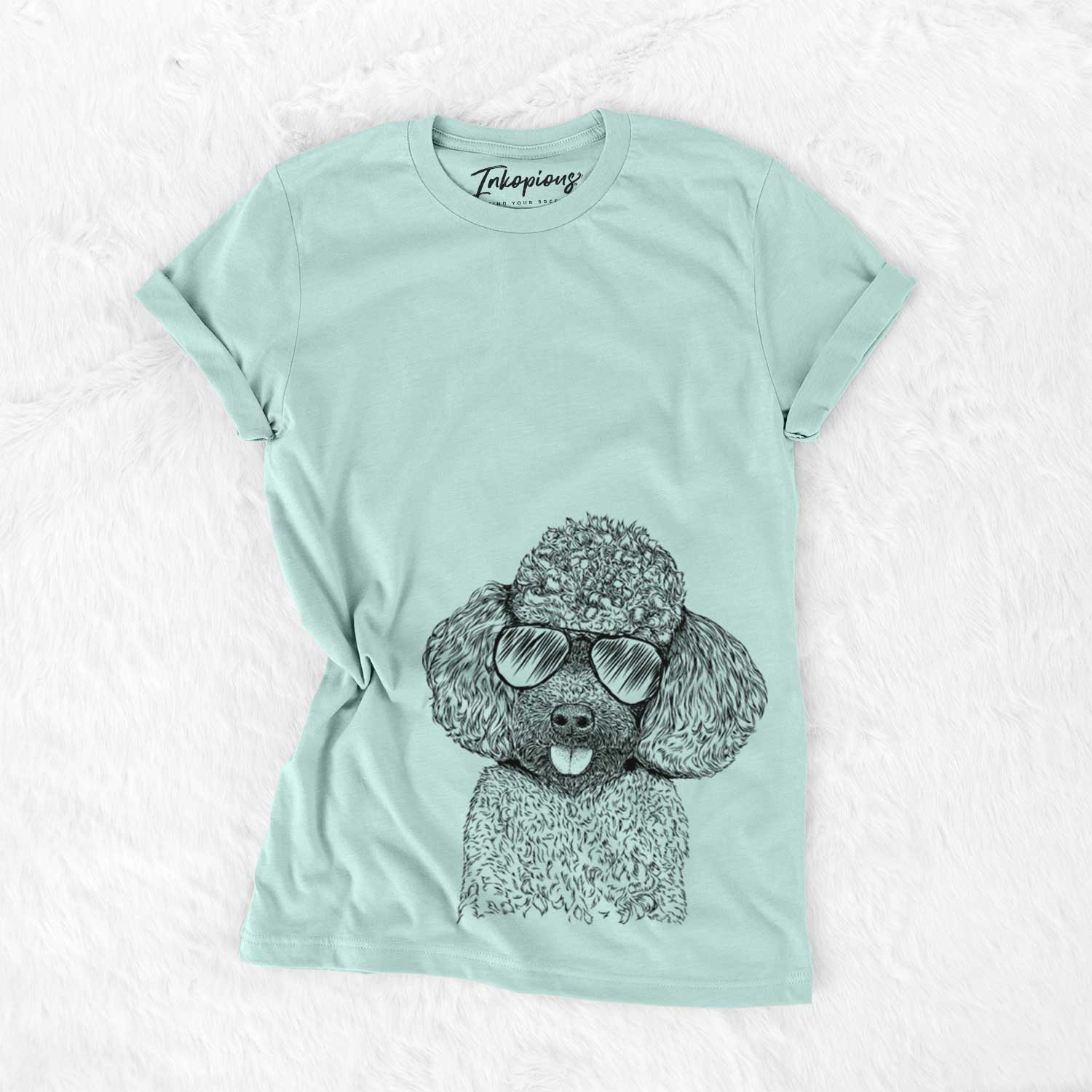 Hand-drawn sketch of George the Toy Poodle wearing aviator sunglasses on a Heather Sage Unisex crewneck