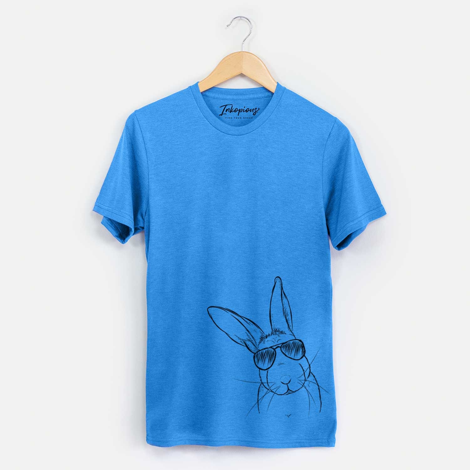 Hand-drawn sketch of Penny the Belgian Hare wearing aviator sunglasses on a Blue Unisex crewneck