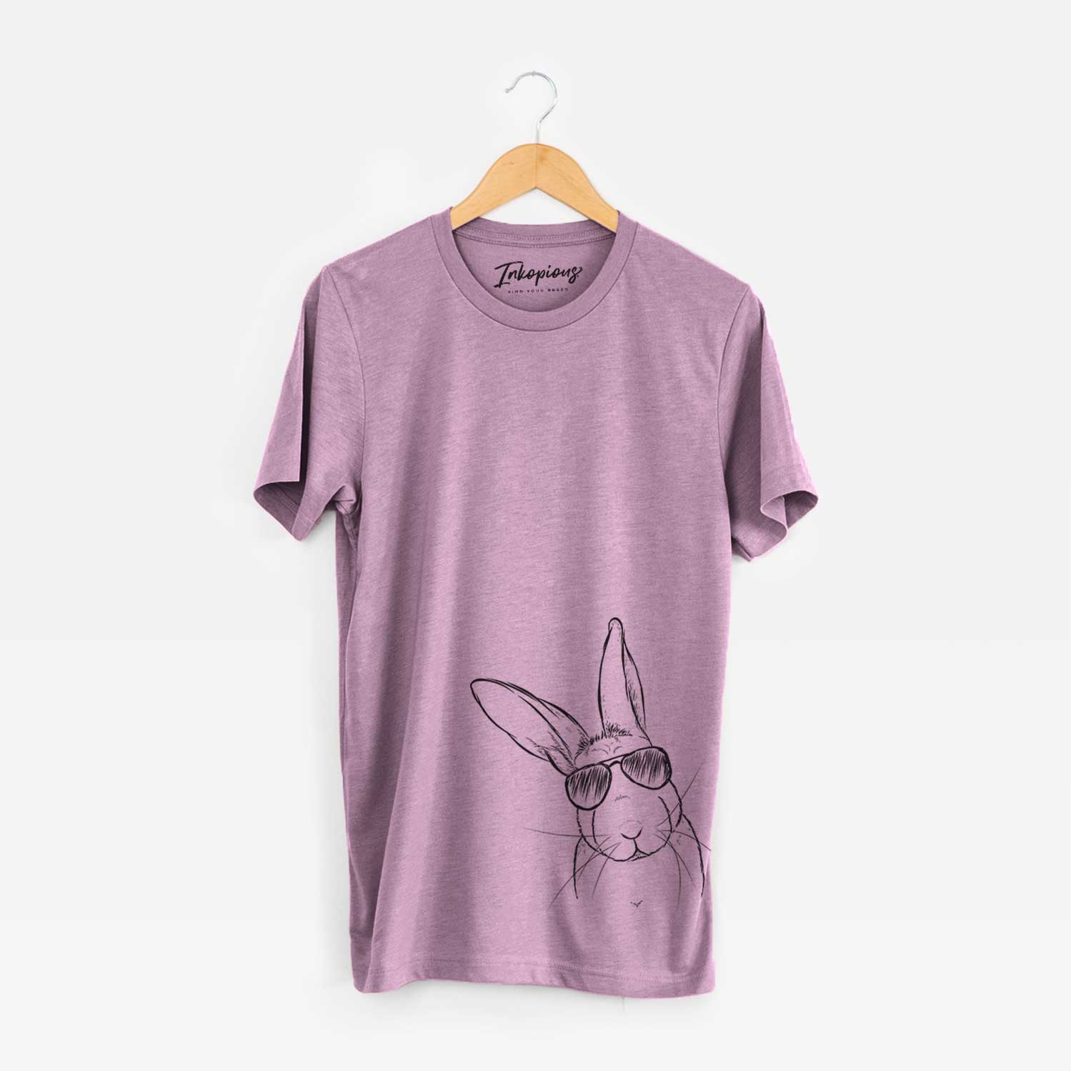 Hand-drawn sketch of Penny the Belgian Hare wearing aviator sunglasses on an Orchid Unisex crewneck