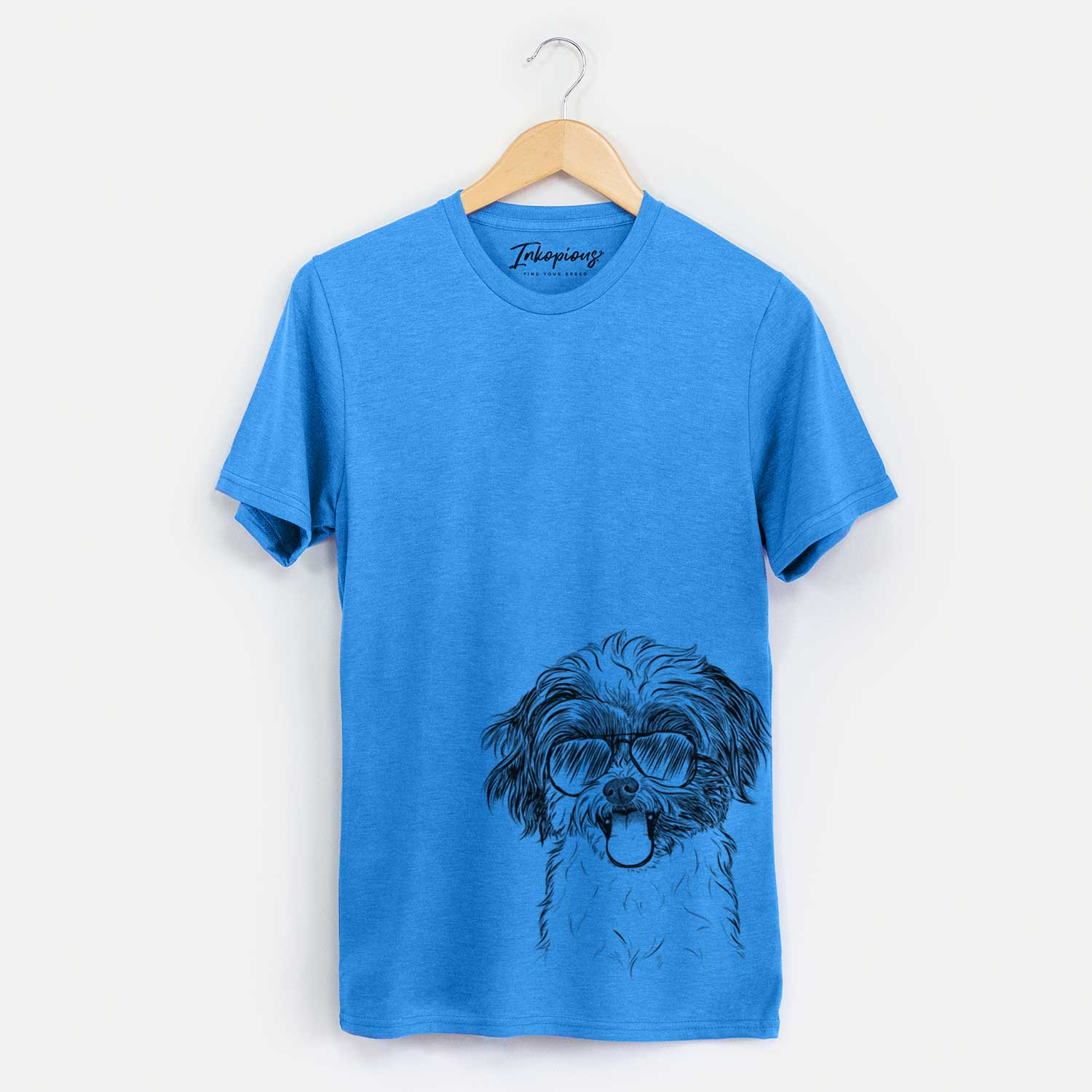 Hand-drawn sketch of Pepper the Shihpoo wearing aviator sunglasses on a Blue Unisex crewneck
