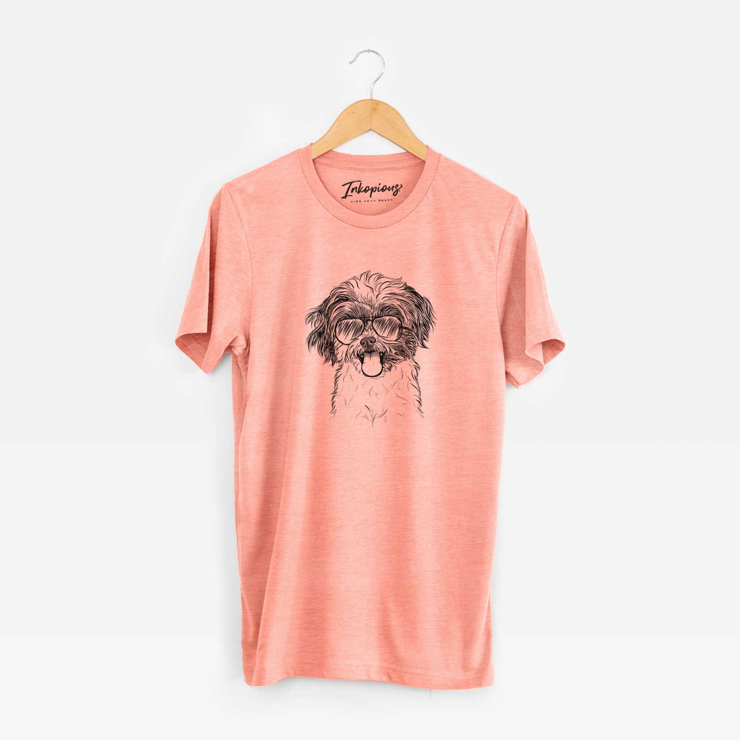 Hand-drawn sketch of Pepper the Shihpoo wearing aviator sunglasses on a Sunset Unisex crewneck