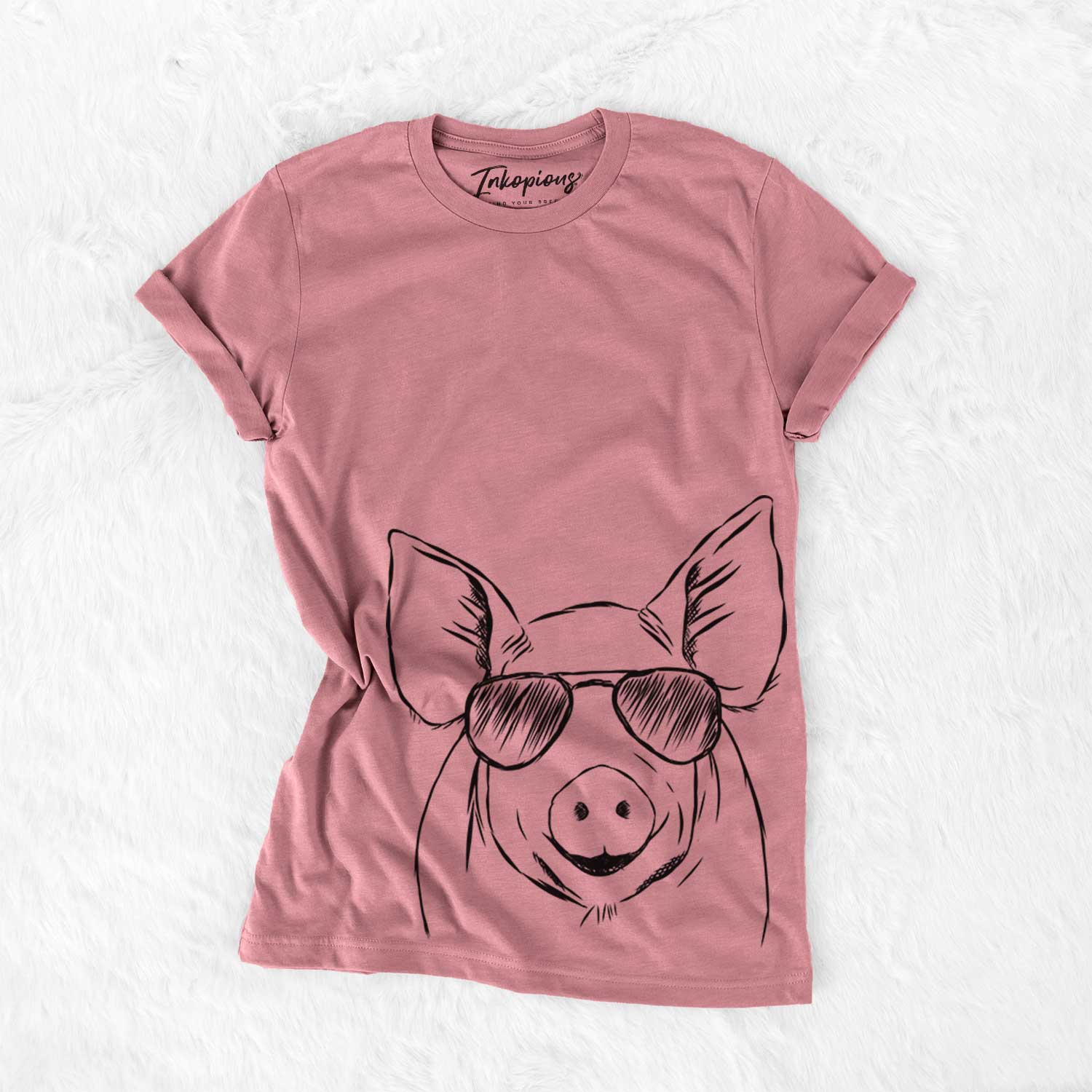 Hand-drawn sketch of Perry the Pig wearing aviator sunglasses on a Mauve Bella Canvas Unisex Crewneck