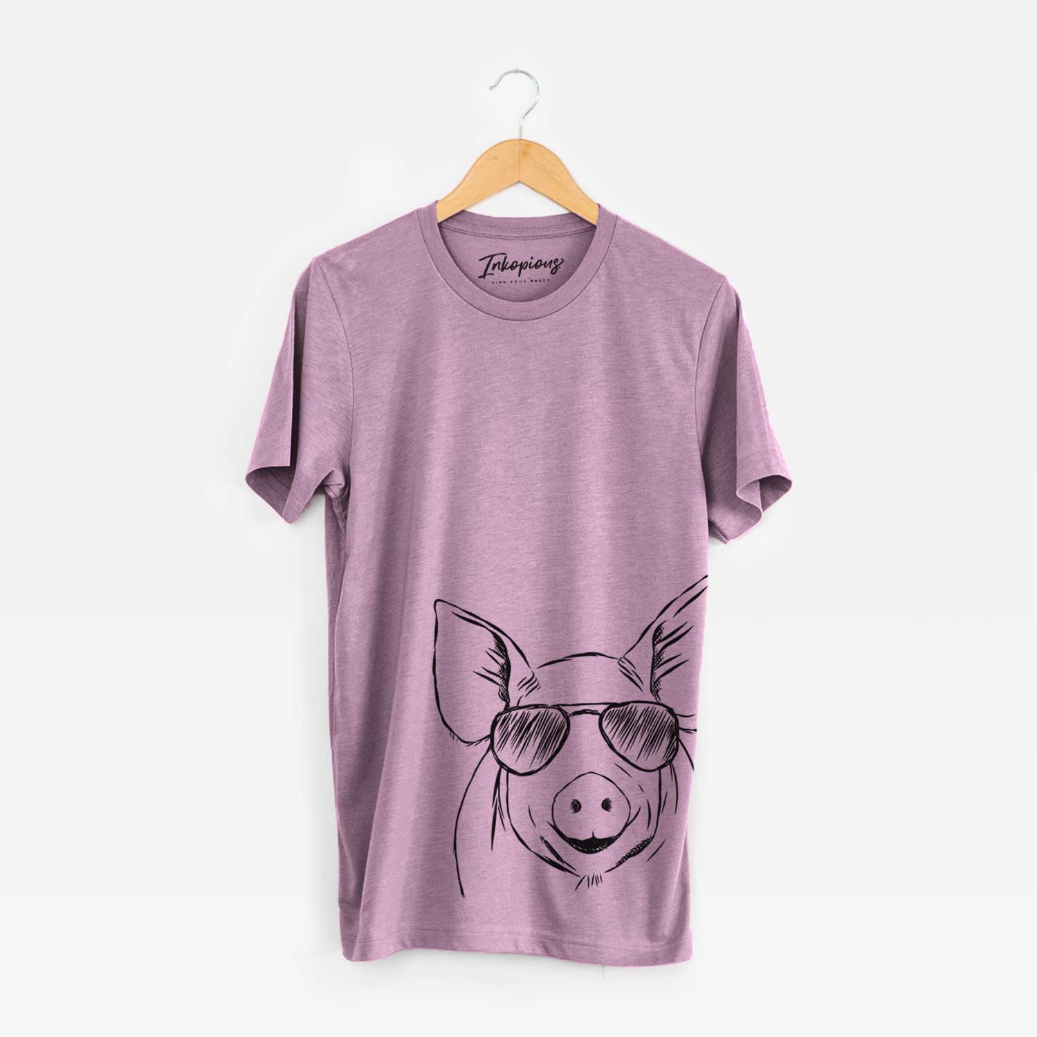 Hand-drawn sketch of Perry the Pig wearing aviator sunglasses on an Orchid Bella Canvas Unisex Crewneck