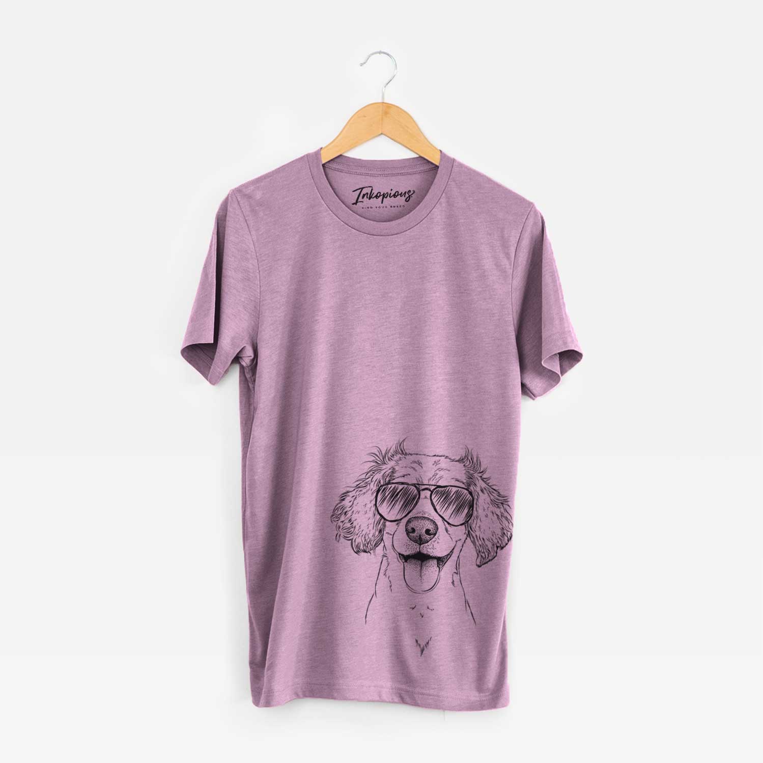Hand-drawn sketch of Piglet the Dachshund Mix wearing aviator sunglasses on an Orchid Unisex crewneck
