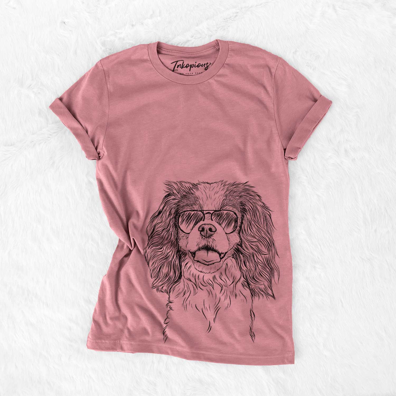 Hand-drawn sketch of Poppy the Cavalier King Charles Spaniel wearing aviator sunglasses on a Mauve Bella Canvas Unisex Crewneck