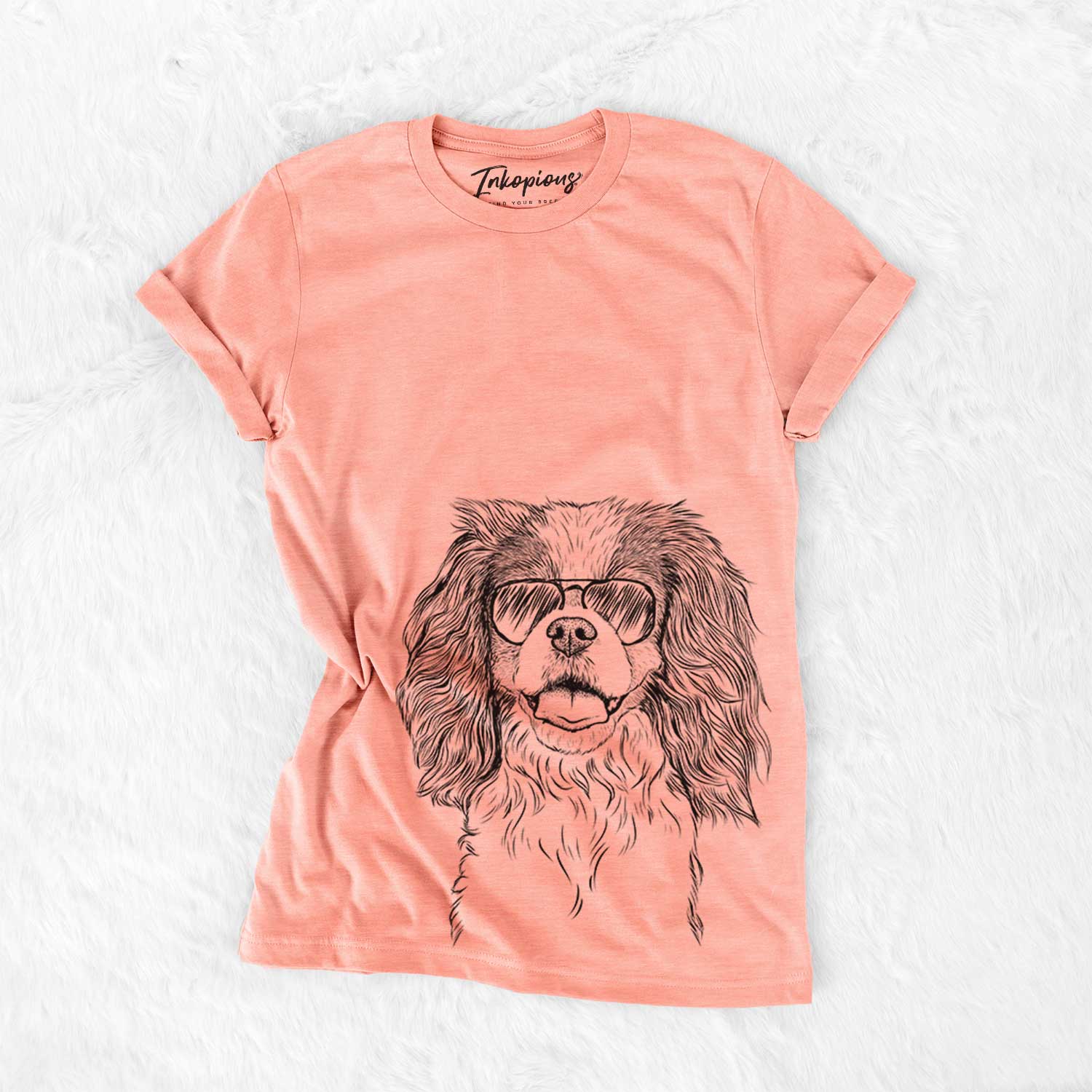 Hand-drawn sketch of Poppy the Cavalier King Charles Spaniel wearing aviator sunglasses on a Sunset Bella Canvas Unisex Crewneck