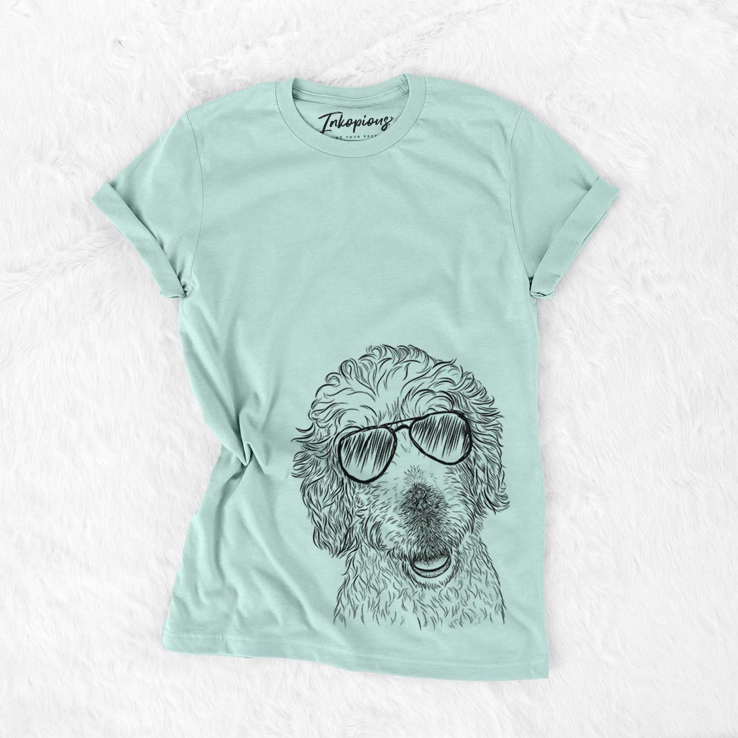 Hand-drawn sketch of Preston the Labradoodle wearing aviator sunglasses on a Heather Sage Unisex crewneck