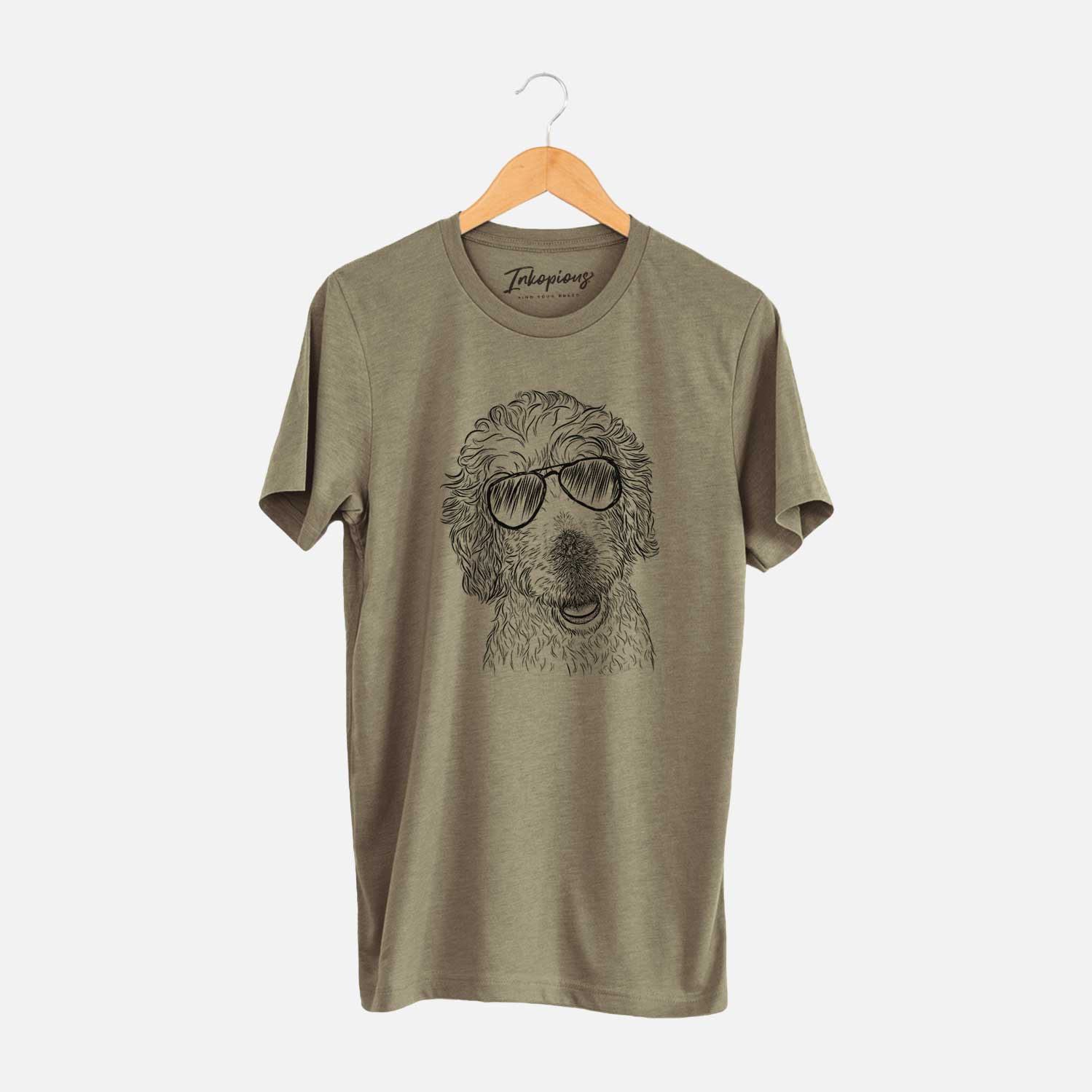 Hand-drawn sketch of Preston the Labradoodle wearing aviator sunglasses on an Olive Unisex crewneck