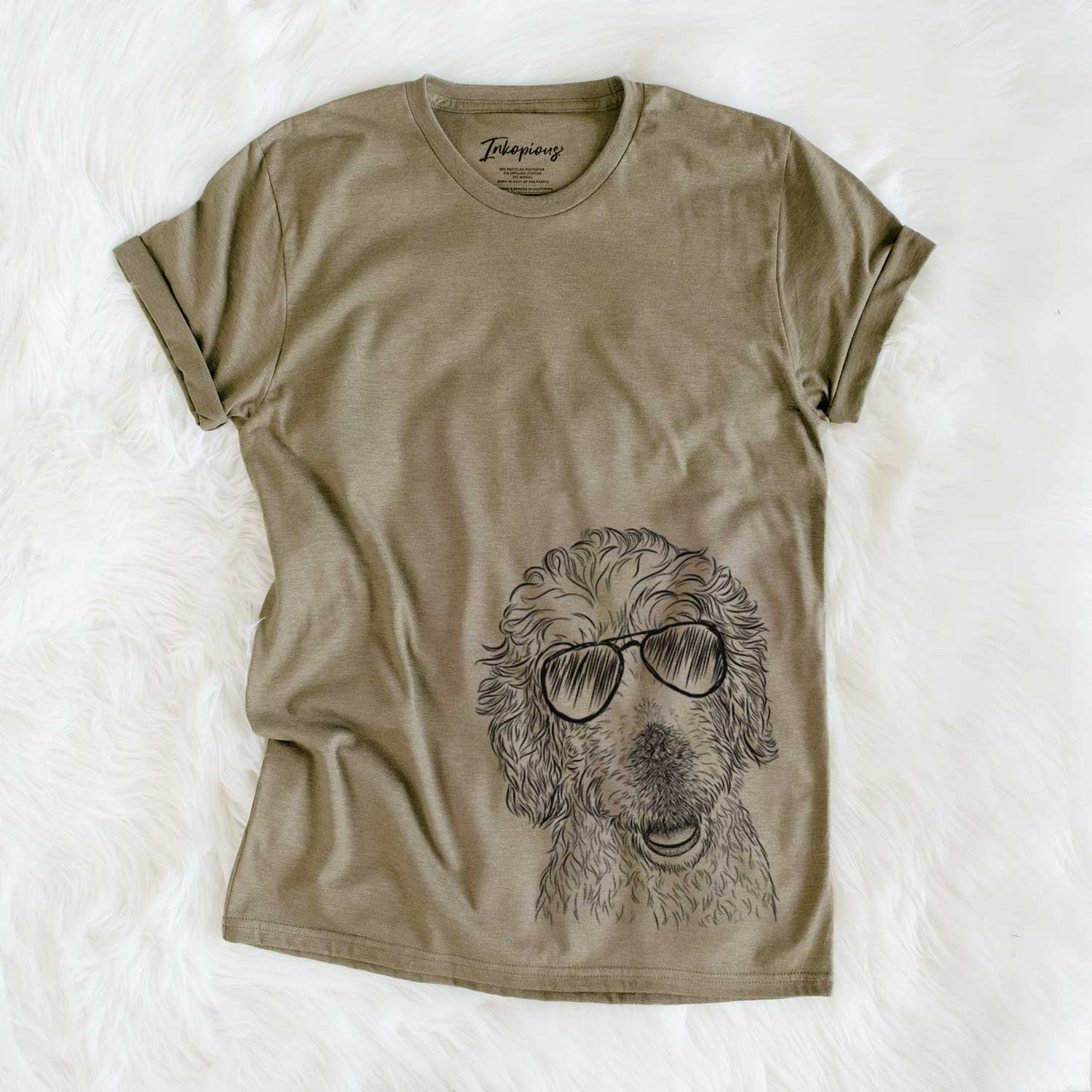 Hand-drawn sketch of Preston the Labradoodle wearing aviator sunglasses on an Olive Unisex crewneck