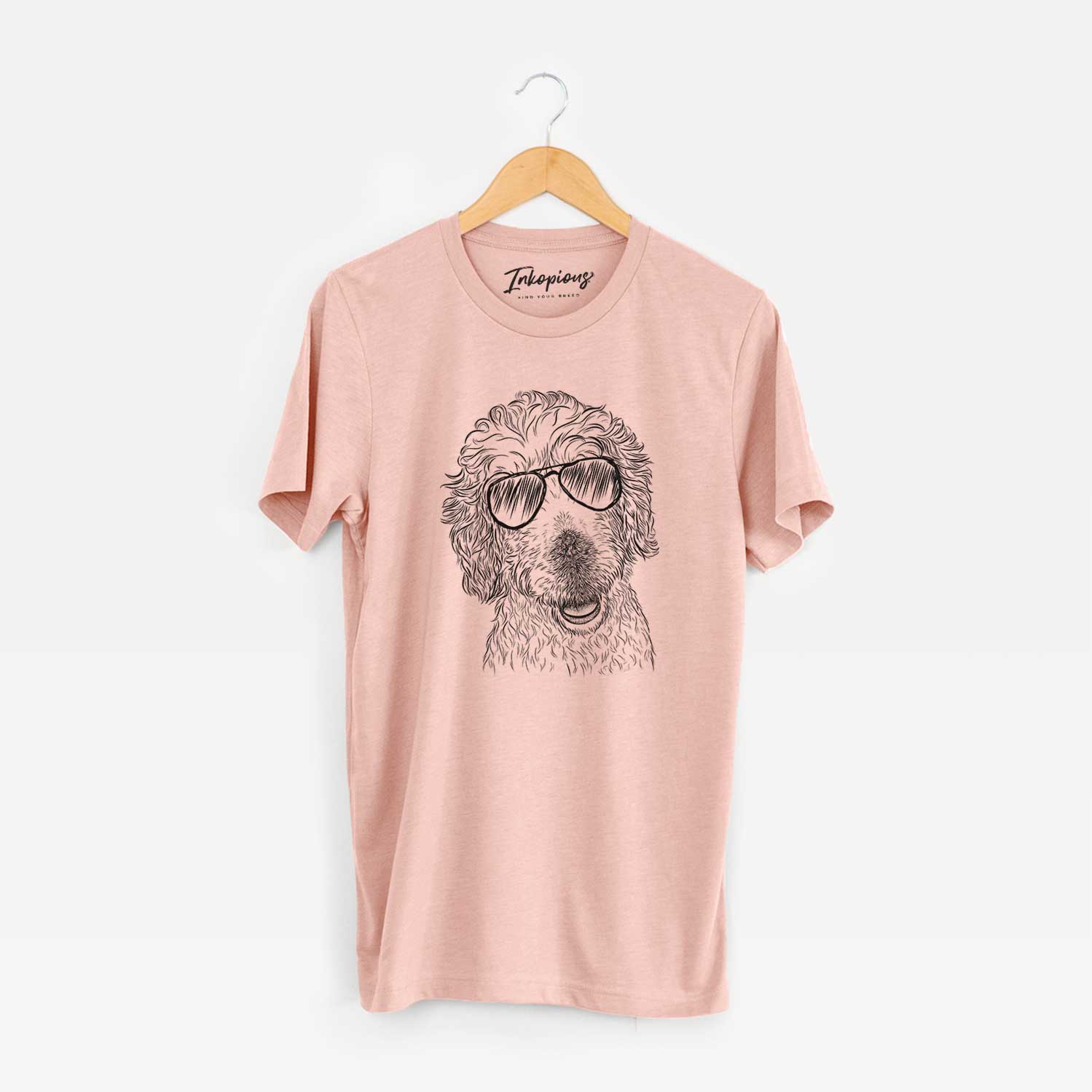 Hand-drawn sketch of Preston the Labradoodle wearing aviator sunglasses on a Peach Unisex crewneck