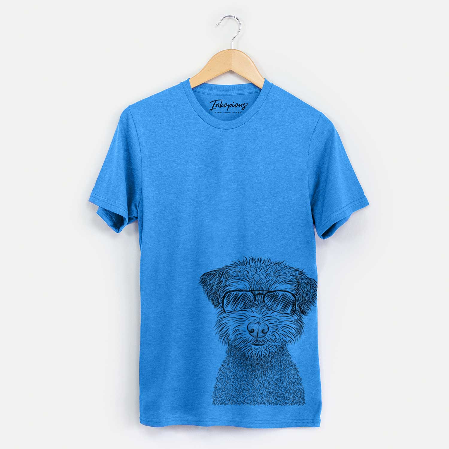 Hand-drawn sketch of Pretzel the Schnoodle wearing aviator sunglasses on a Blue Unisex crewneck