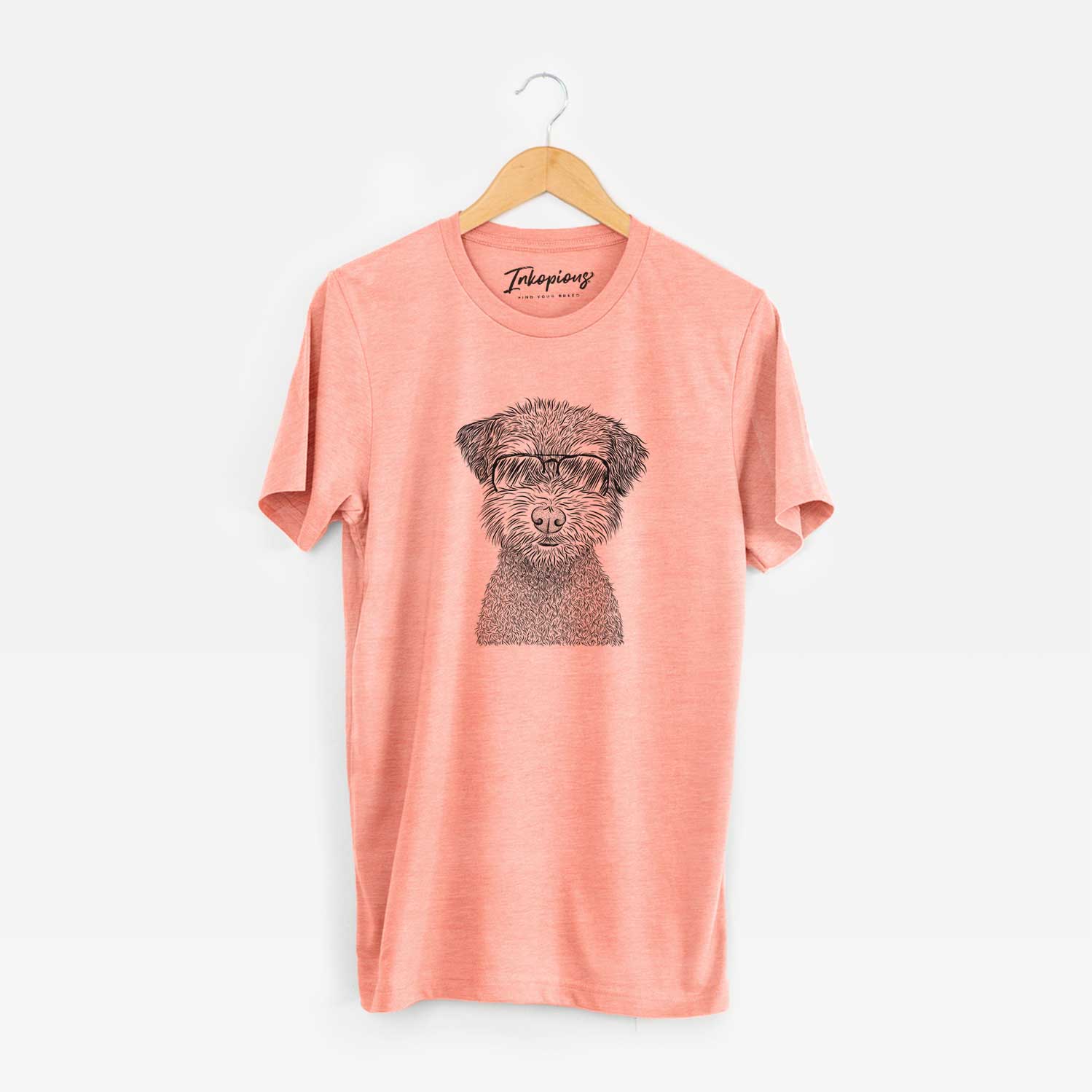 Hand-drawn sketch of Pretzel the Schnoodle wearing aviator sunglasses on a Sunset Unisex crewneck